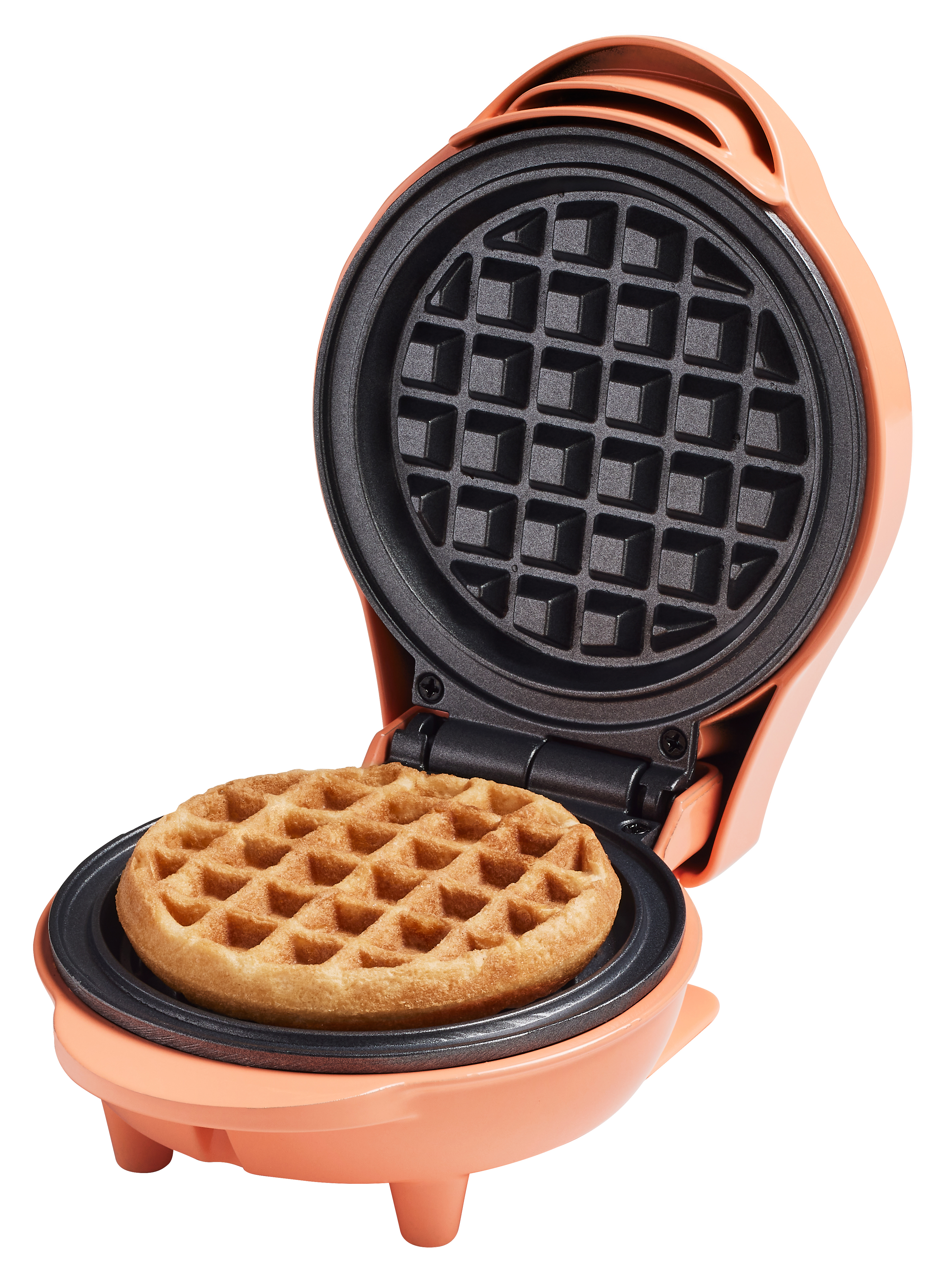 Open peach waffle maker with a cooked waffle inside. The top is open showing the grid pattern.