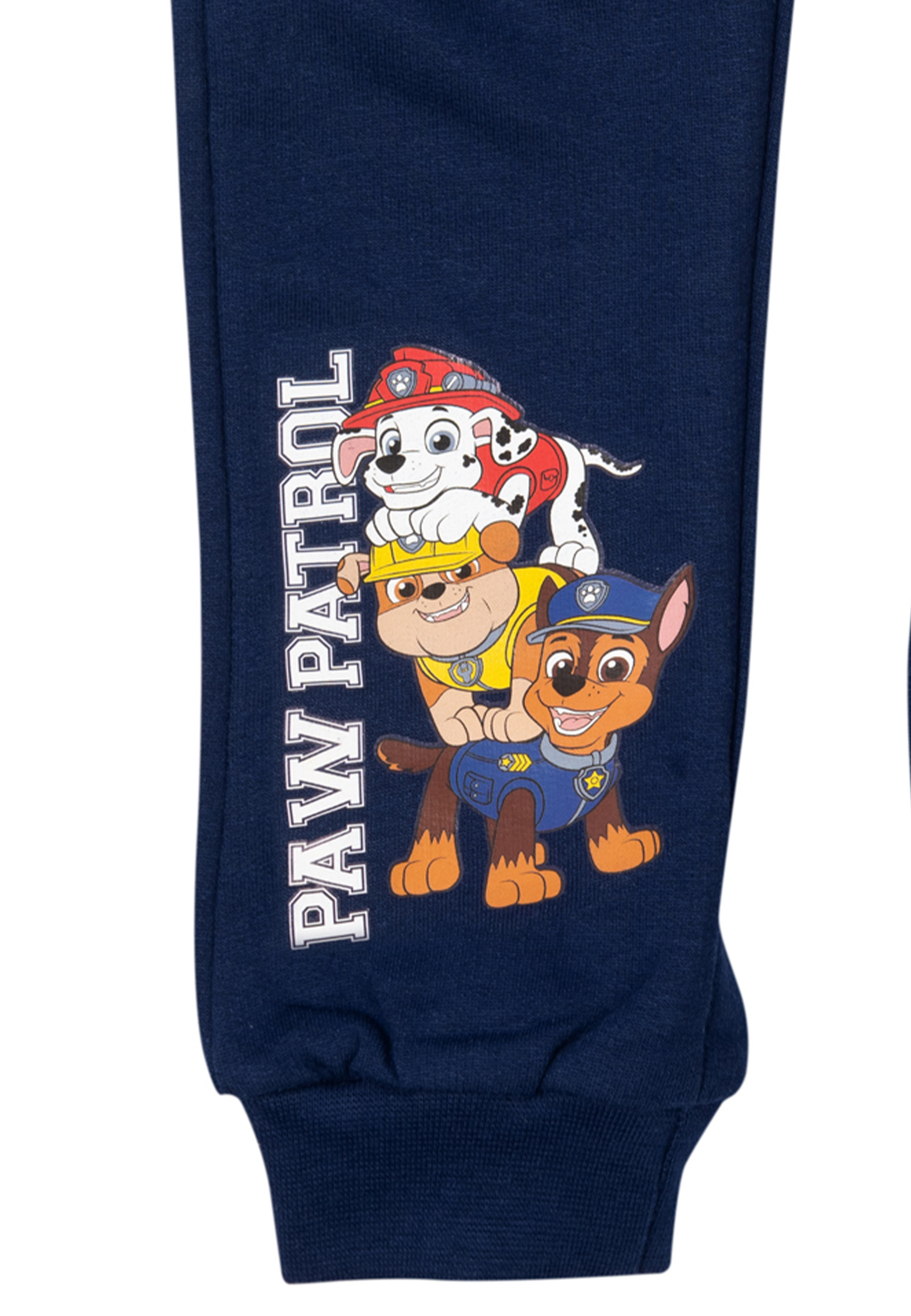Dunkelblaue Hose mit Paw Patrol-Grafik. Drei Zeichentrickhunde sind übereinander gestapelt. Der Text lautet Paw Patrol.