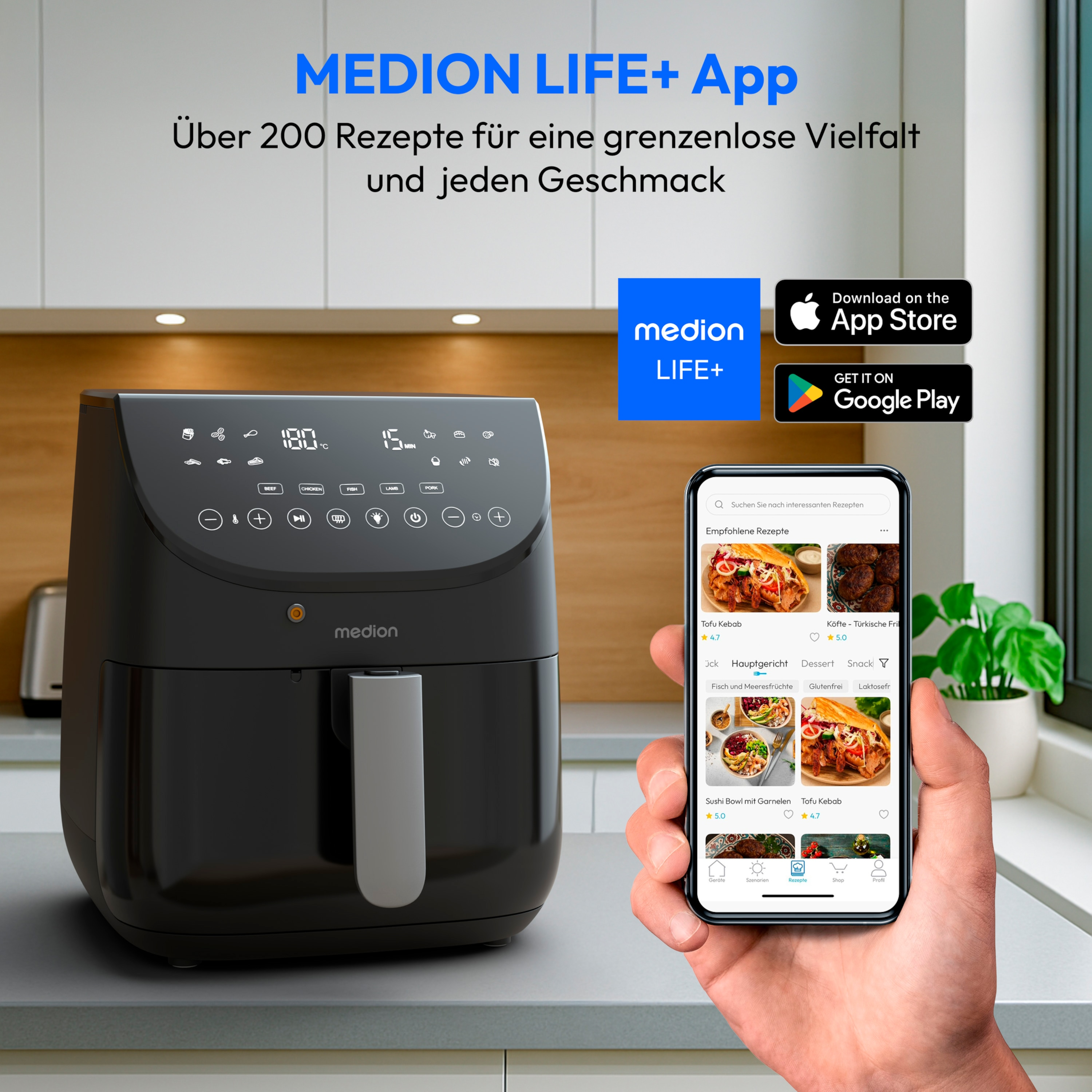 Zwarte airfryer en telefoon met recepten. Het scherm toont een kook-app met voedselafbeeldingen.