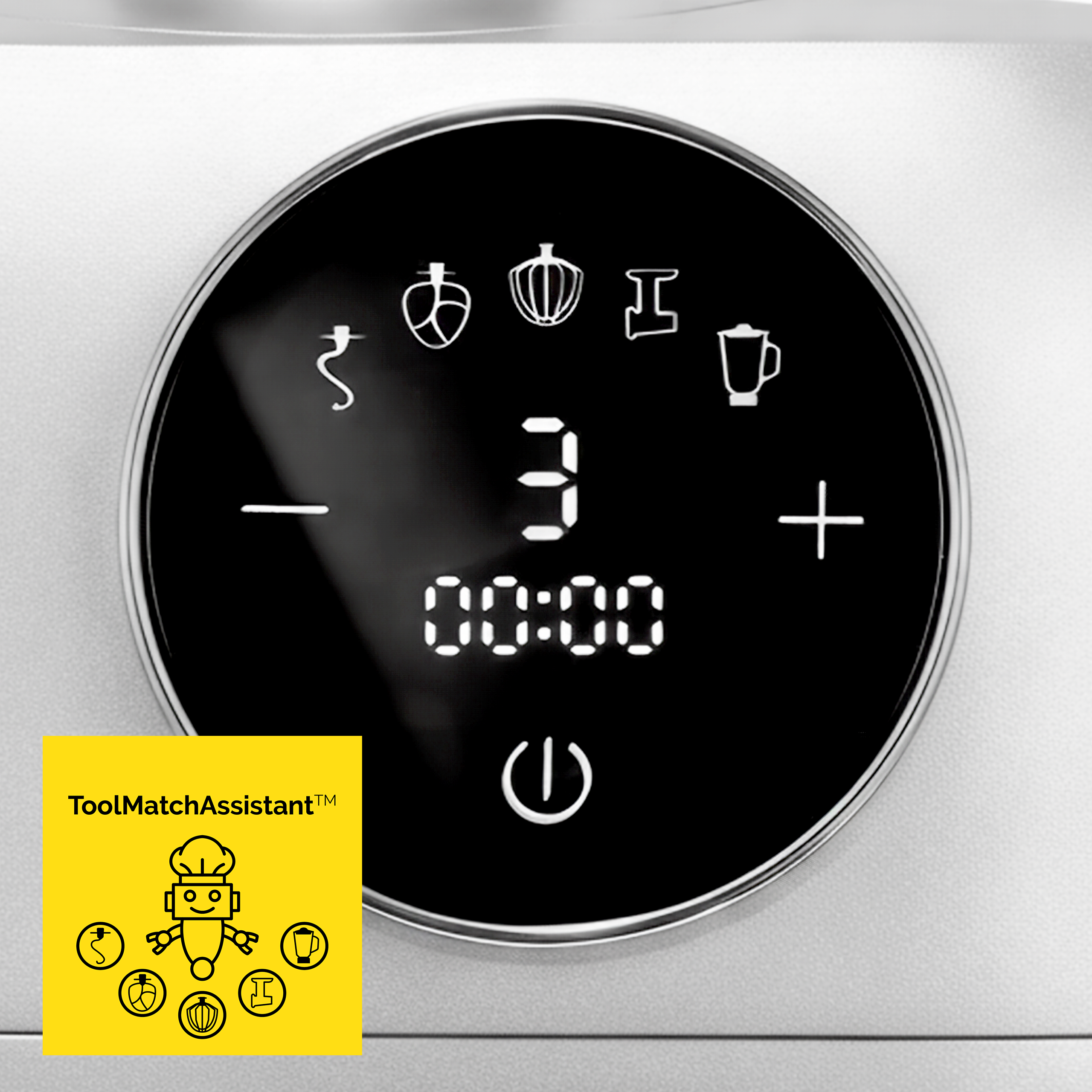 Czarny, okrągły panel sterowania z białymi ikonami i liczbami. Po lewej stronie żółty prostokąt z robotem kucharzem.