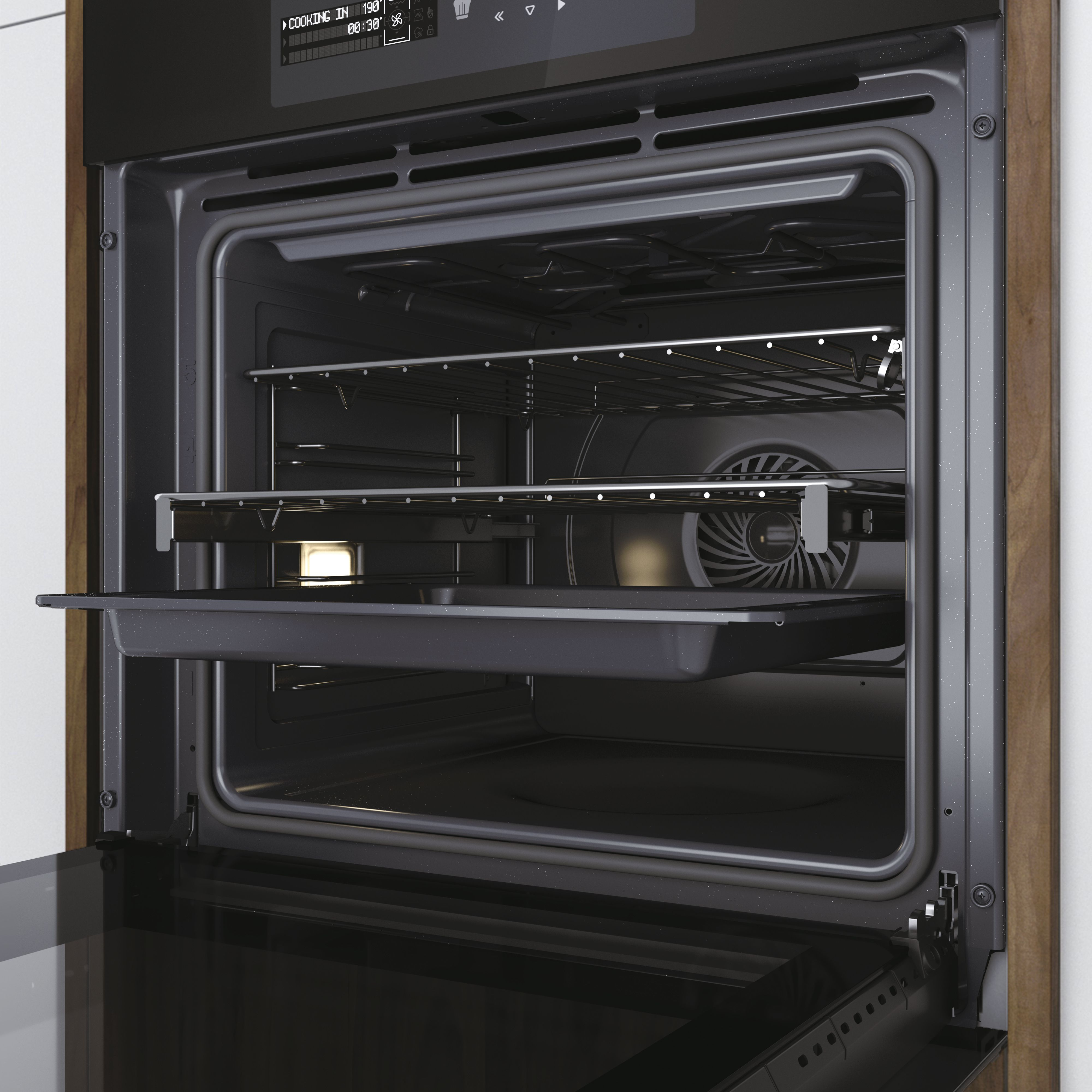 Un horno con la puerta abierta, mostrando el interior. Hay una bandeja extraída y una rejilla dentro. El horno es negro.