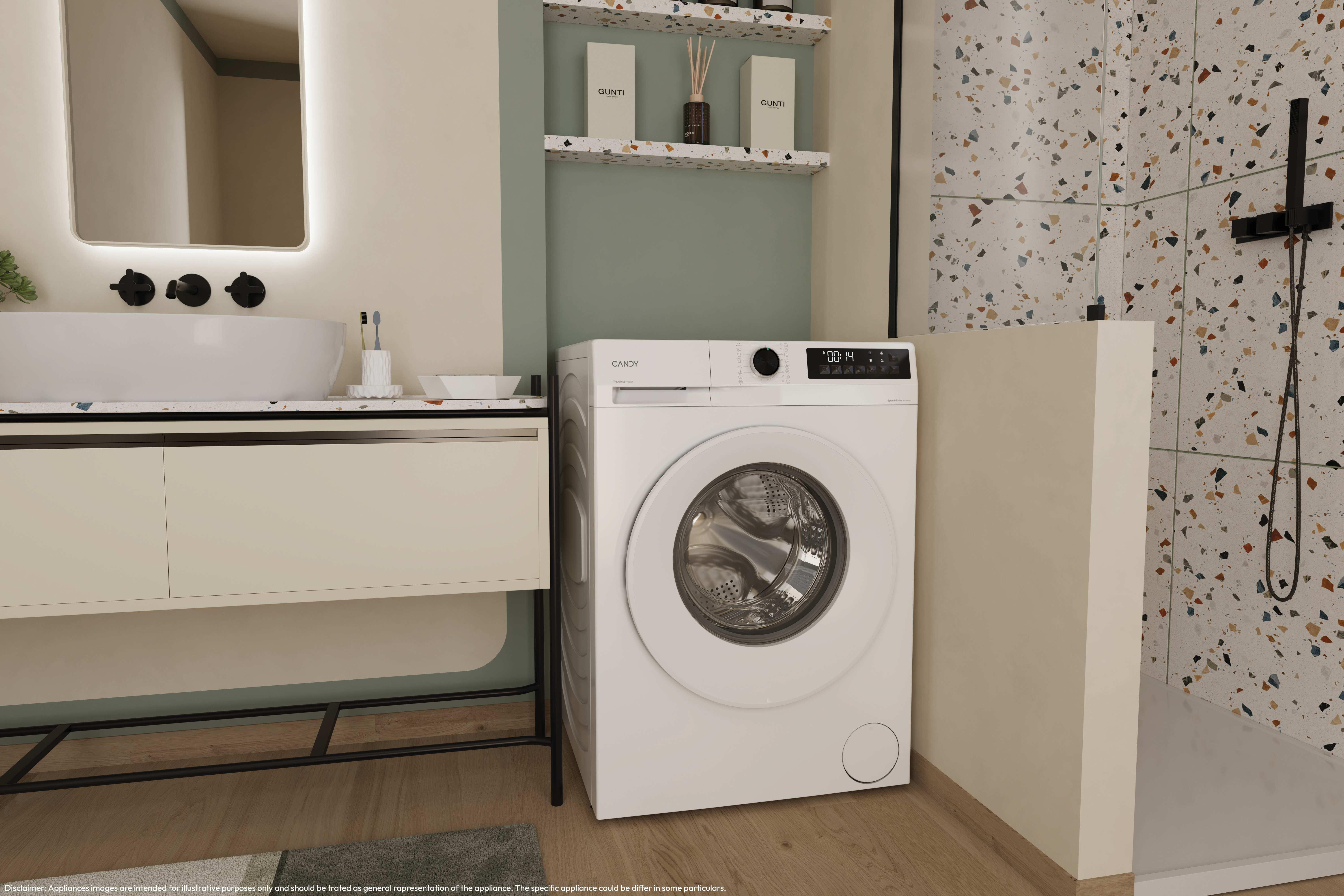 Weiße Waschmaschine in einem Badezimmer. Ein Waschbecken und eine Dusche sind ebenfalls sichtbar. Die Wände sind hellbeige.