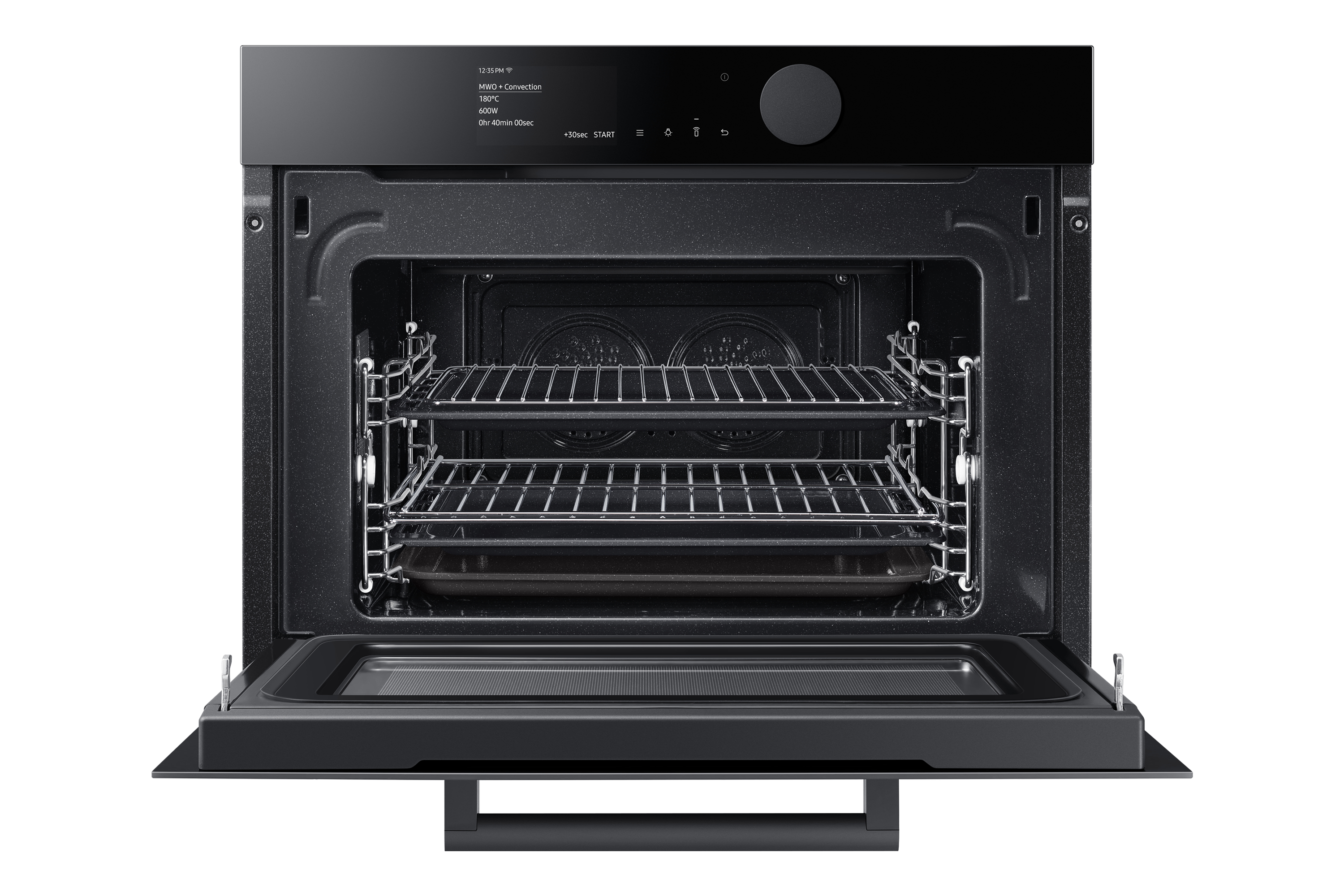 Forno nero aperto con ripiani interni. Il display mostra le impostazioni: MWO+Convection, 180C, 600W, timer 0:40.