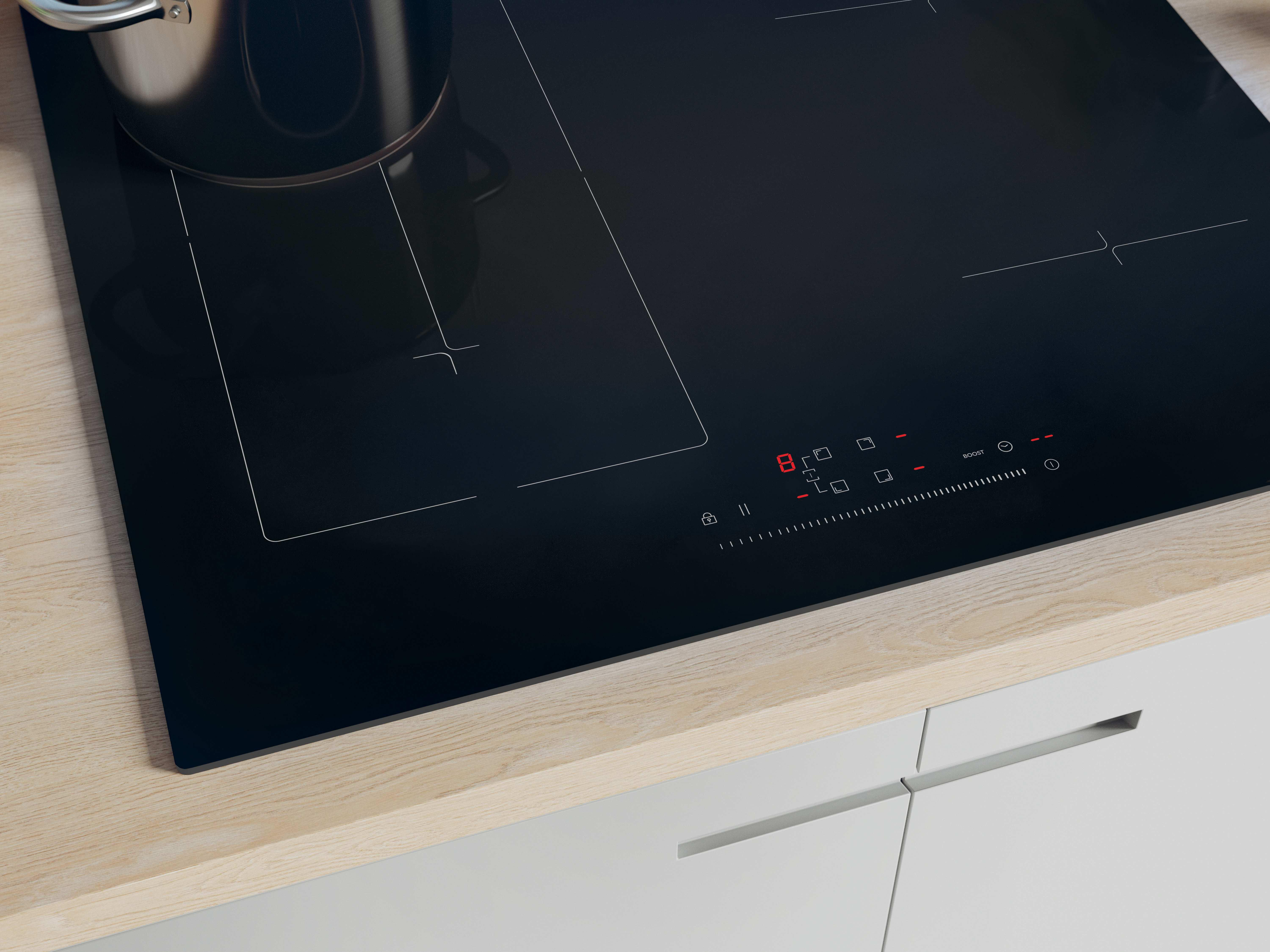 Czarna płyta indukcyjna z garnkiem. Panel sterowania pokazuje czerwoną cyfrę 8. Beżowy blat.