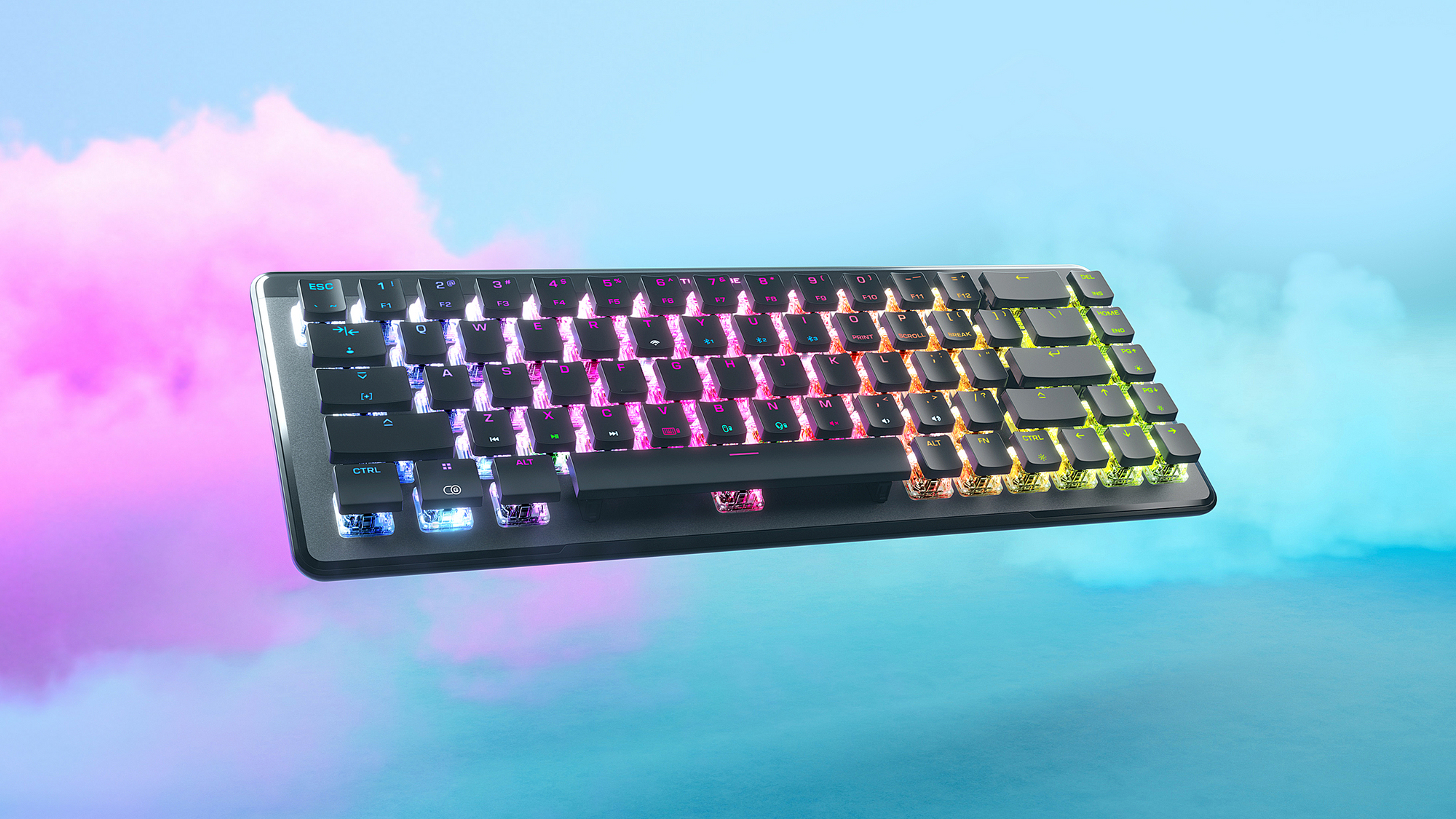 Eine leuchtende, schwarze Tastatur schwebt vor einem bunten Wolkenhintergrund. Die Tasten leuchten in verschiedenen Farben.