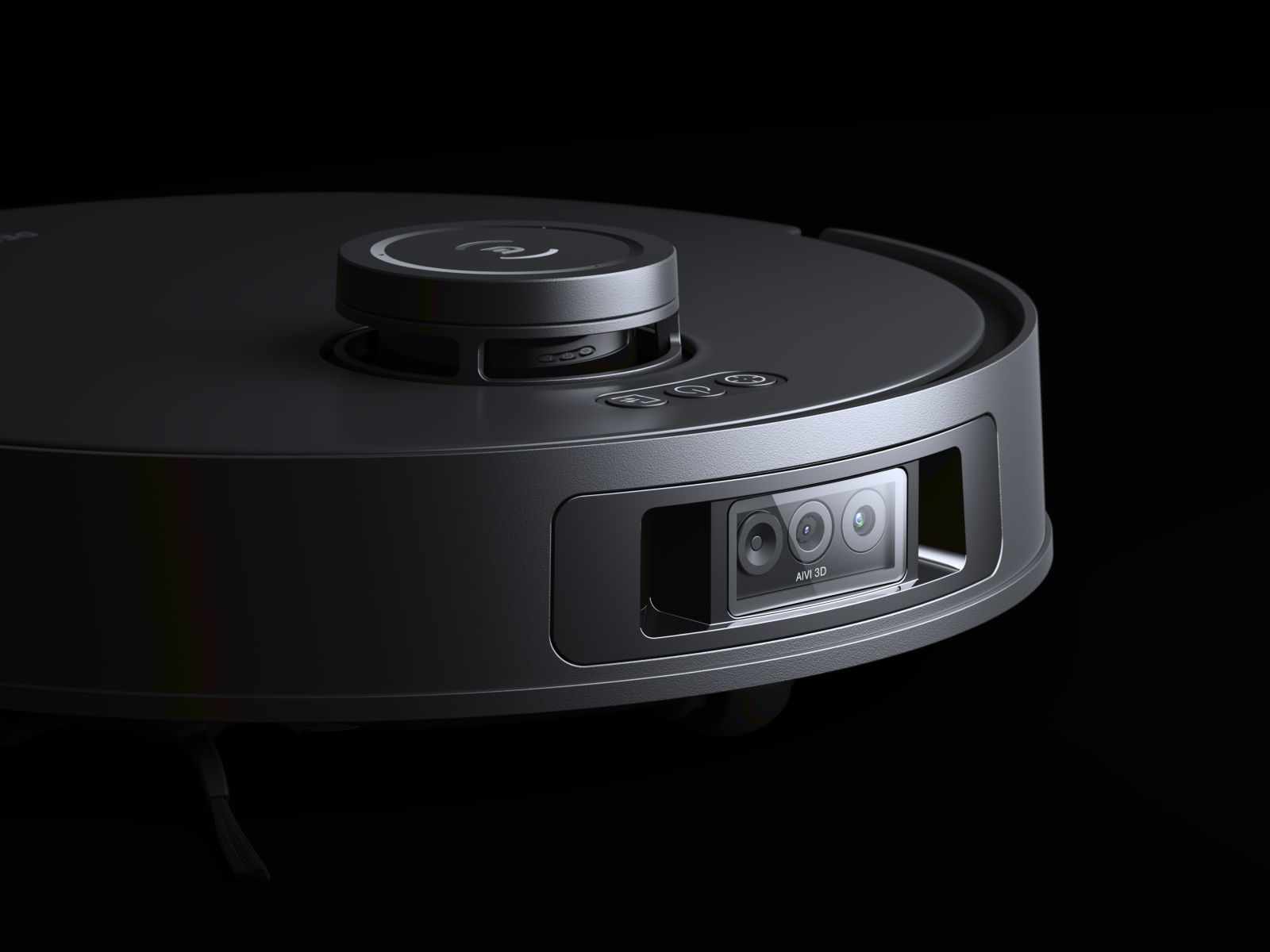 Zbliżenie czarnego robota odkurzającego na czarnym tle. Posiada kamerę i przyciski sterujące.