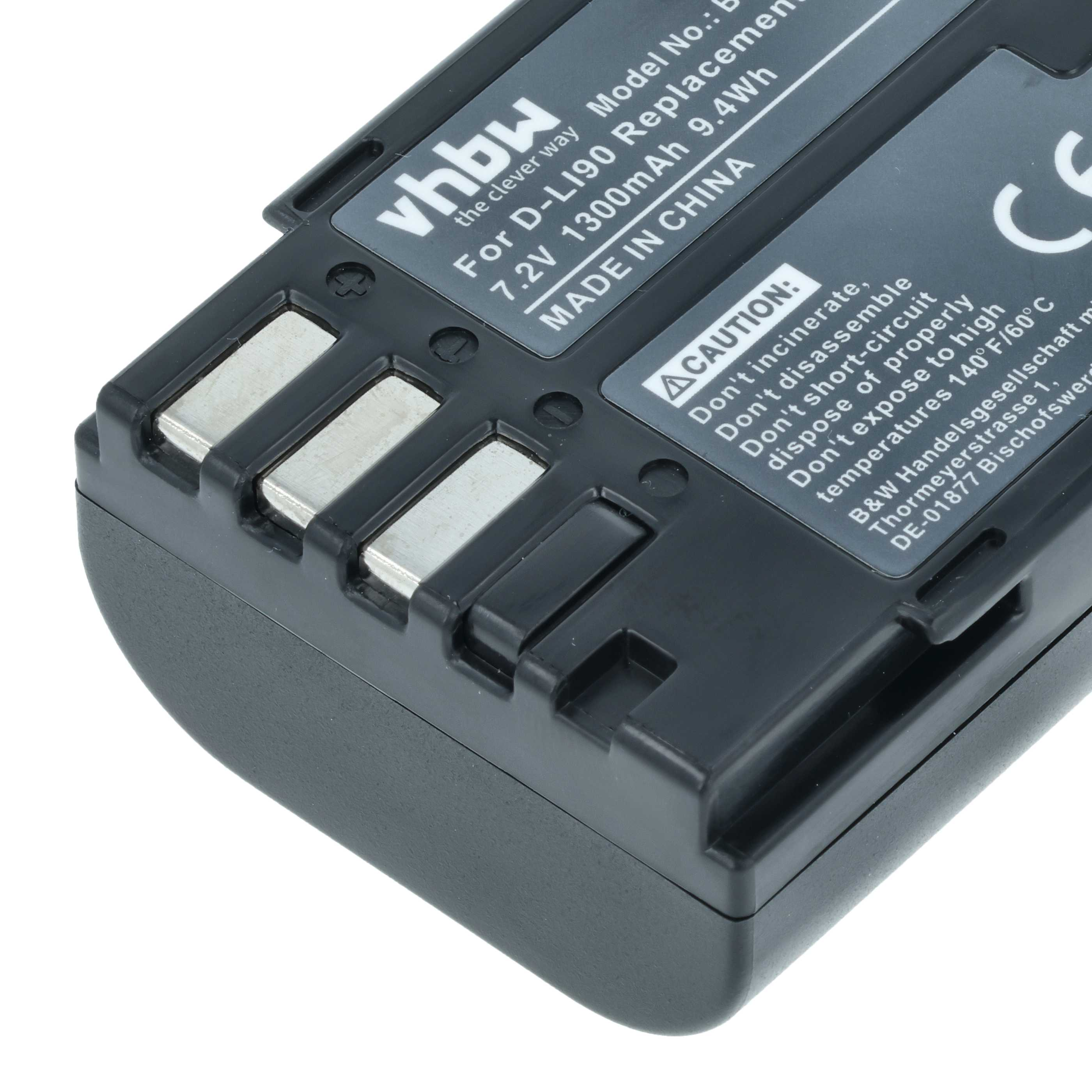 Nahaufnahme einer schwarzen vhbw-Batterie mit Etiketten und silbernen Kontakten. Weißer Hintergrund.