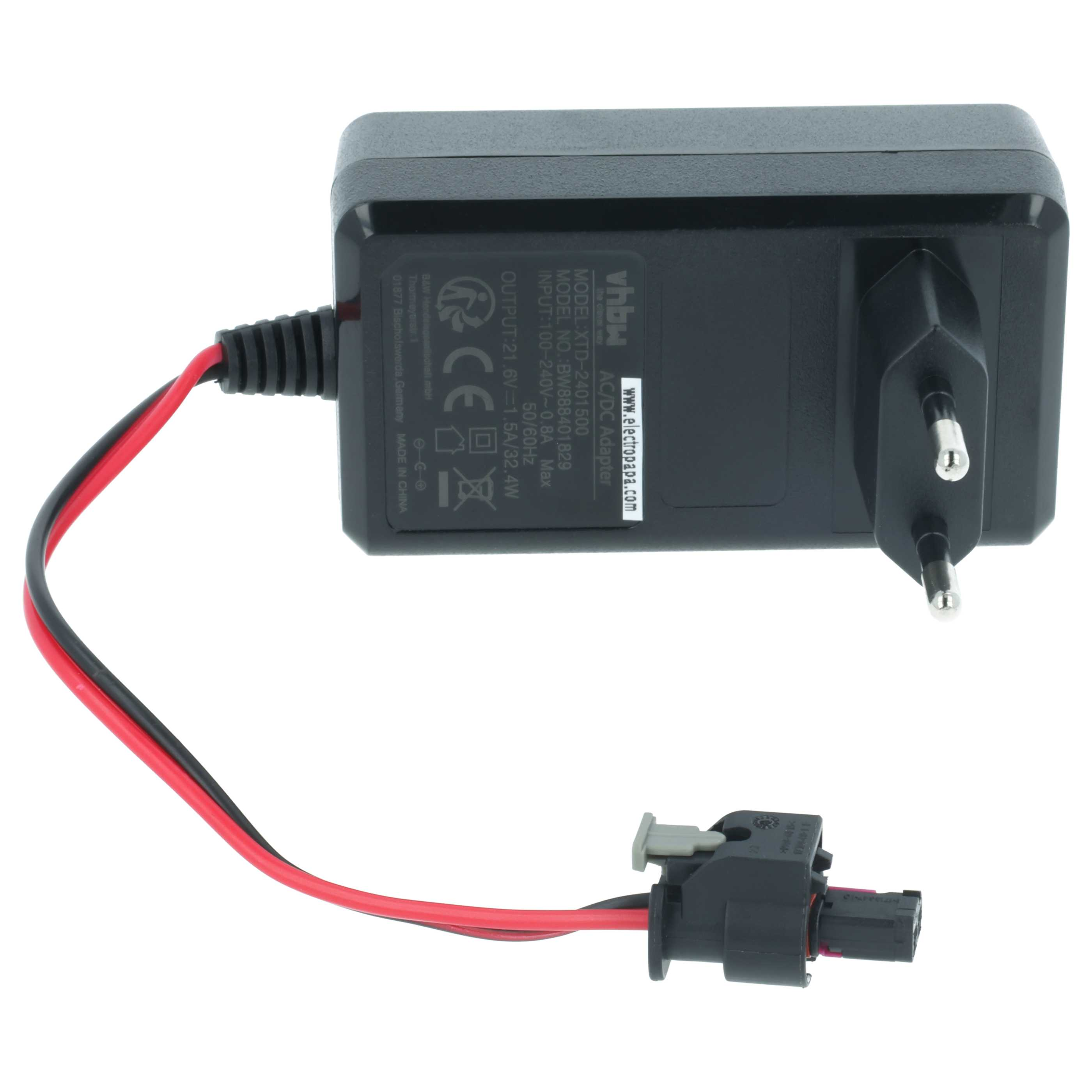 Ein AC/DC-Adapter mit Stecker und Anschluss. Er hat schwarze und rote Drähte. Der Adapter ist schwarz.
