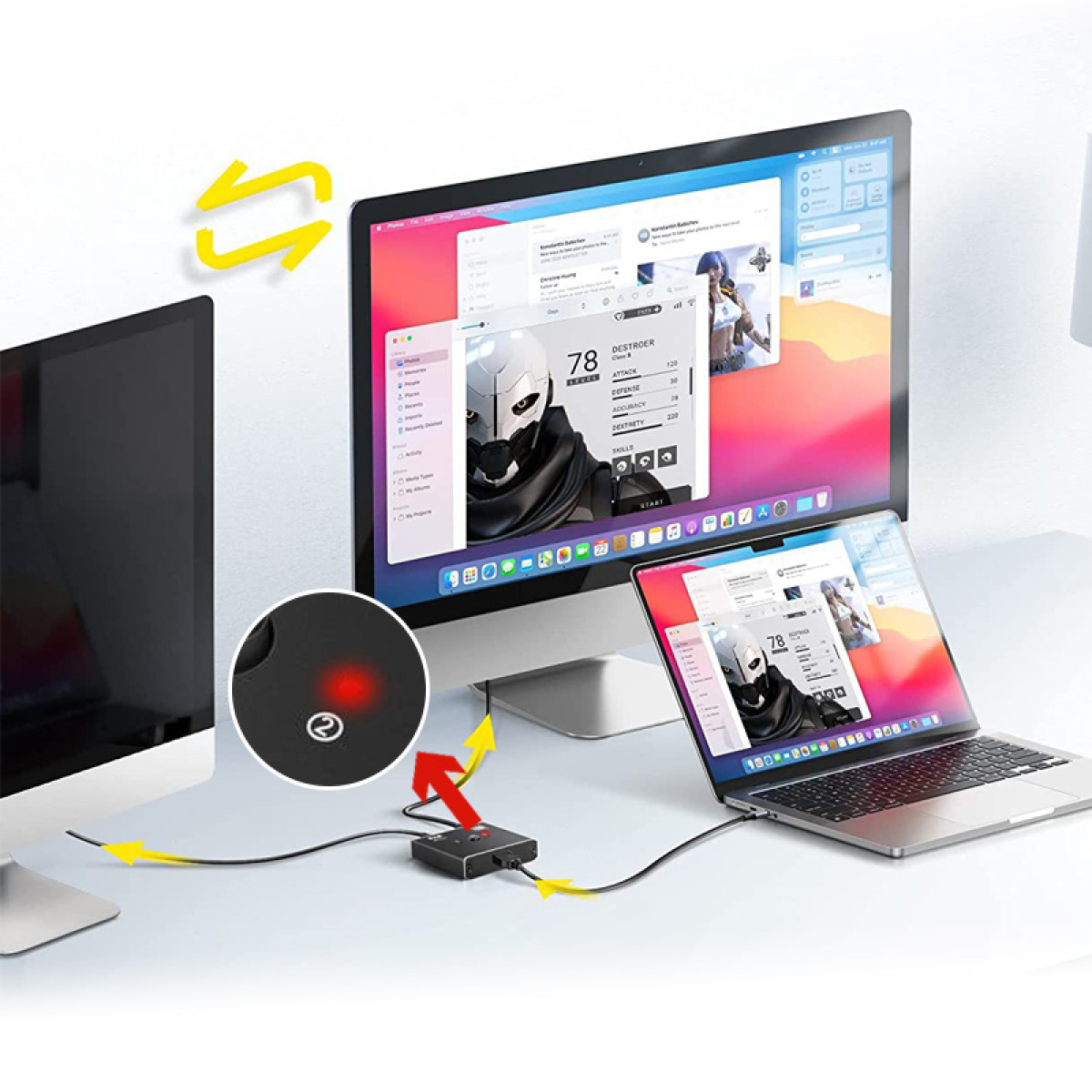 Konfiguracja z wieloma ekranami, laptopem i urządzeniem łączącym je. Ekrany wyświetlają interfejs gry.