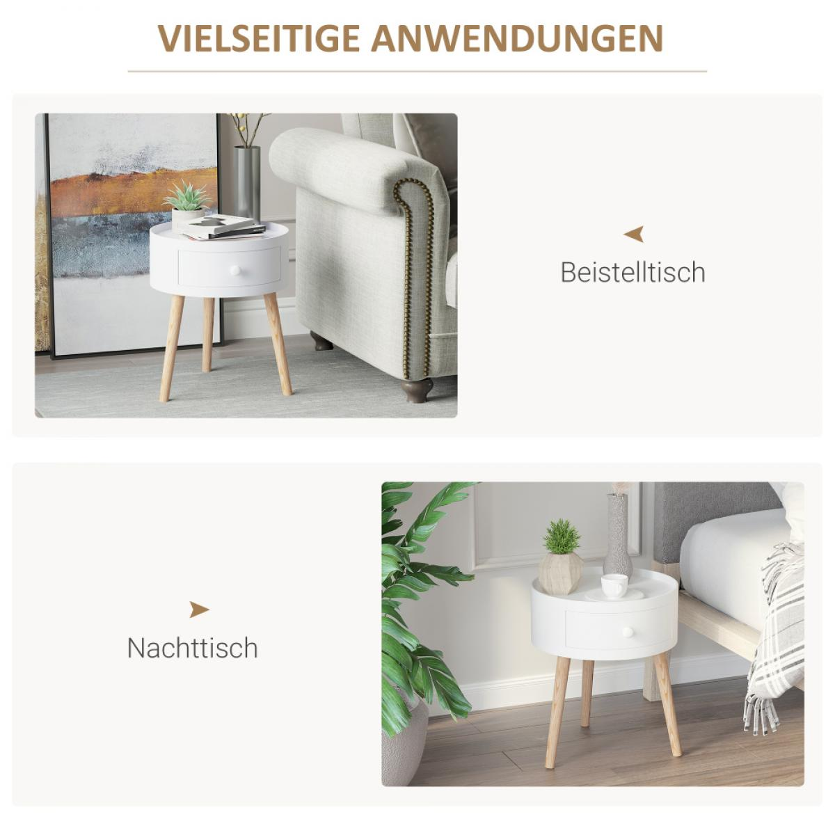 Das Bild zeigt einen weißen Nachttisch mit Holzbeinen. Er steht in der Nähe eines Sofas und eines Bettes. Es gibt einige Pflanzen und Dekorationen.