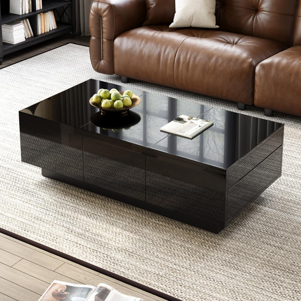 Ein modernes Wohnzimmer mit einem schwarzen Couchtisch, einem braunen Ledersofa und einer Schale mit grünen Limetten.
