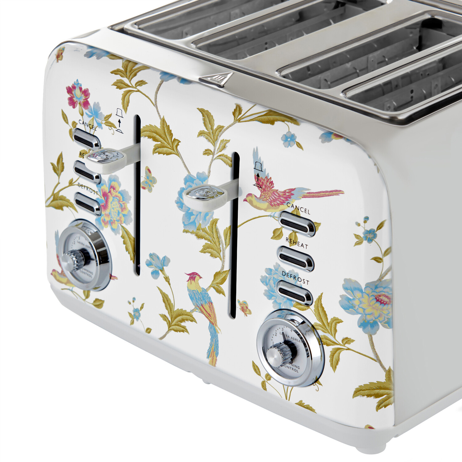 Ein weißer Toaster mit Blumenmustern und Vogelillustrationen. Er hat Knöpfe für Abbrechen, Aufwärmen und Auftauen mit Bräunungskontrolle.