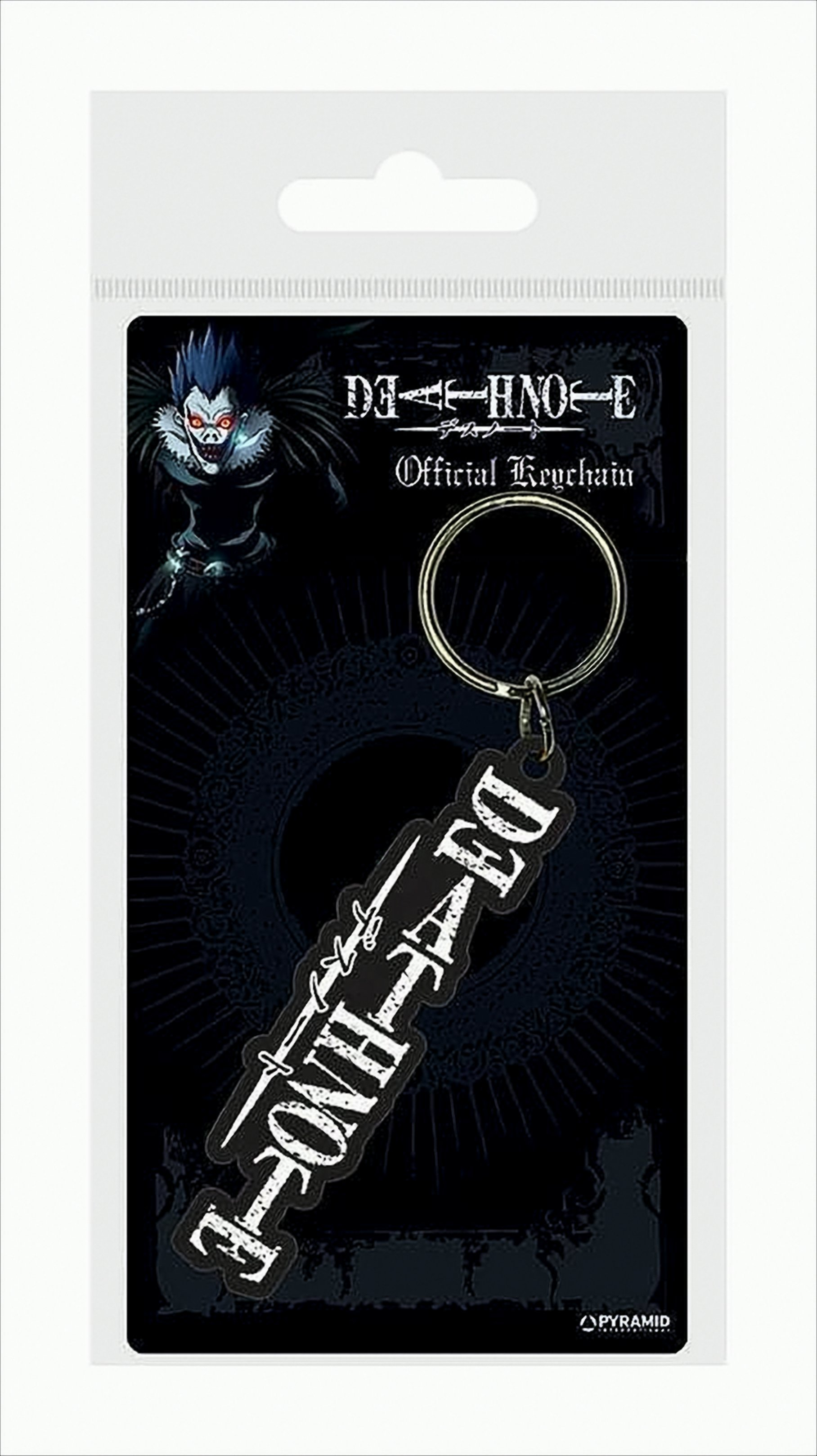 Ein Schlüsselanhänger in einer Plastikverpackung. Der Schlüsselanhänger hat den Text "Death Note". Eine Anime-Figur ist ebenfalls zu sehen.