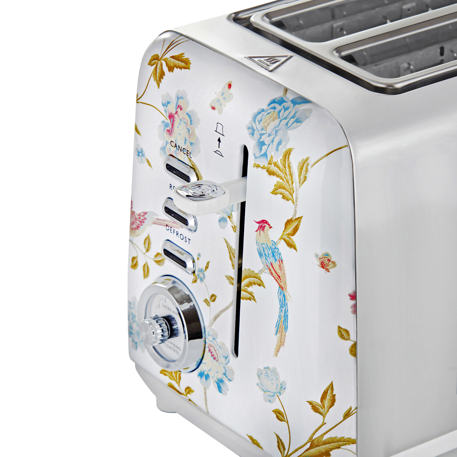 Ein weißer Toaster mit floralen Mustern und einem Vogel. Er hat Knöpfe und Schlitze für Brot.