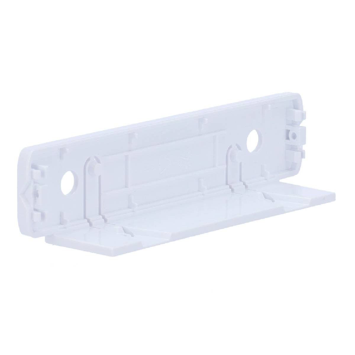 Un objeto de plástico blanco con forma rectangular. Tiene agujeros y varias superficies anguladas. Está sobre un fondo blanco.
