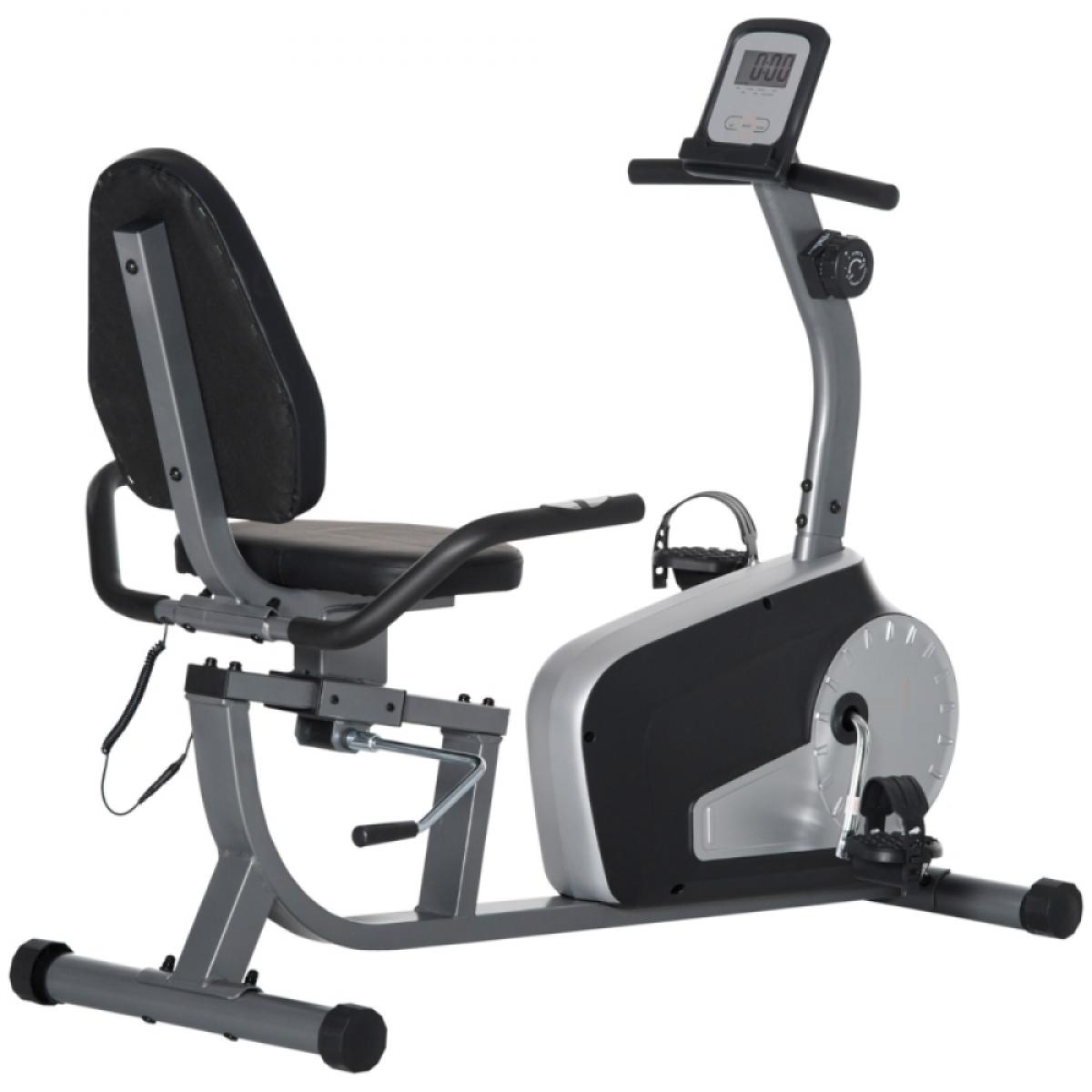 Ein Liege-Heimtrainer. Er hat einen schwarzen Sitz und eine Rückenlehne, Pedale und ein digitales Display. Der Rahmen ist grau und schwarz.