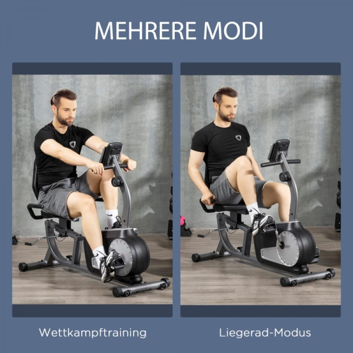 Zwei Männer auf Trainingsrädern, die verschiedene Modi demonstrieren. Einer ist Wettkampftraining, der andere Liegerad-Modus. Schwarze Hemden, graue Shorts.