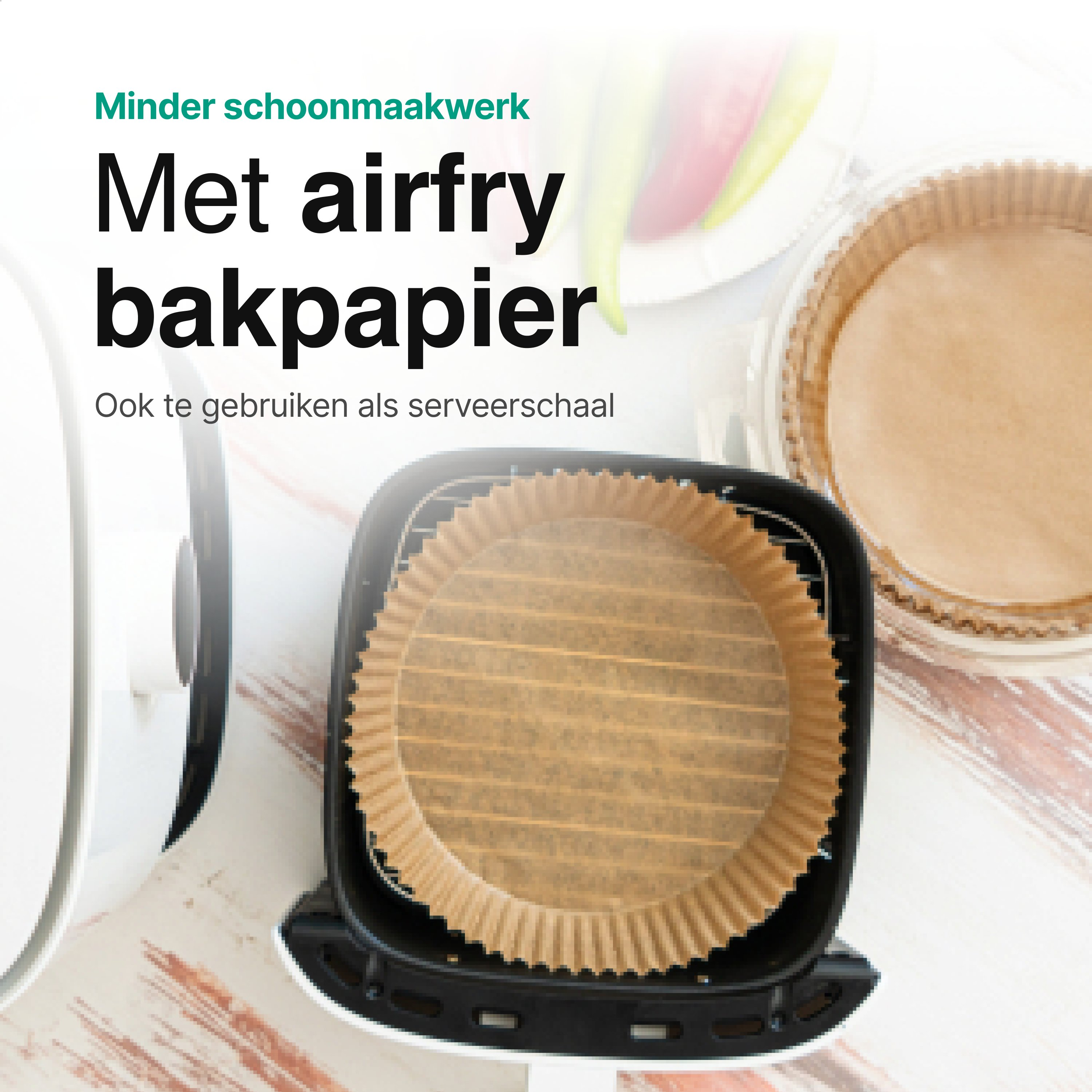 An air fryer with a brown paper liner. Text reads 'Less cleaning. With airfryer baking paper'.