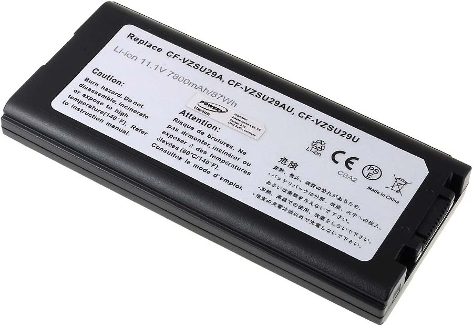 Batería negra con etiqueta blanca, texto en inglés, japonés y francés. Contiene advertencias y especificaciones del producto.