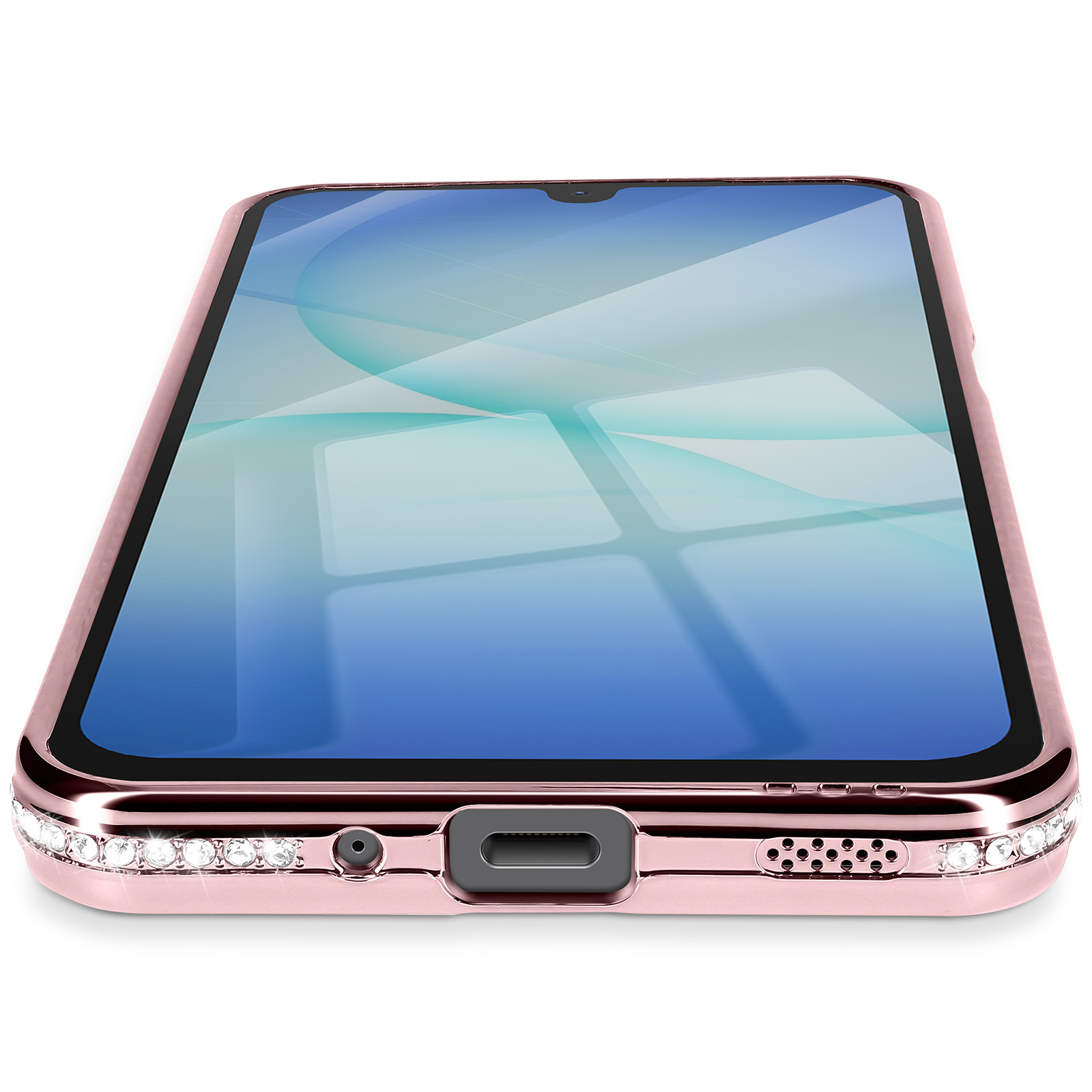 Smartphone or rose avec bordure ornée de bijoux, écran bleu. Incliné, montrant le bas avec port et haut-parleurs.