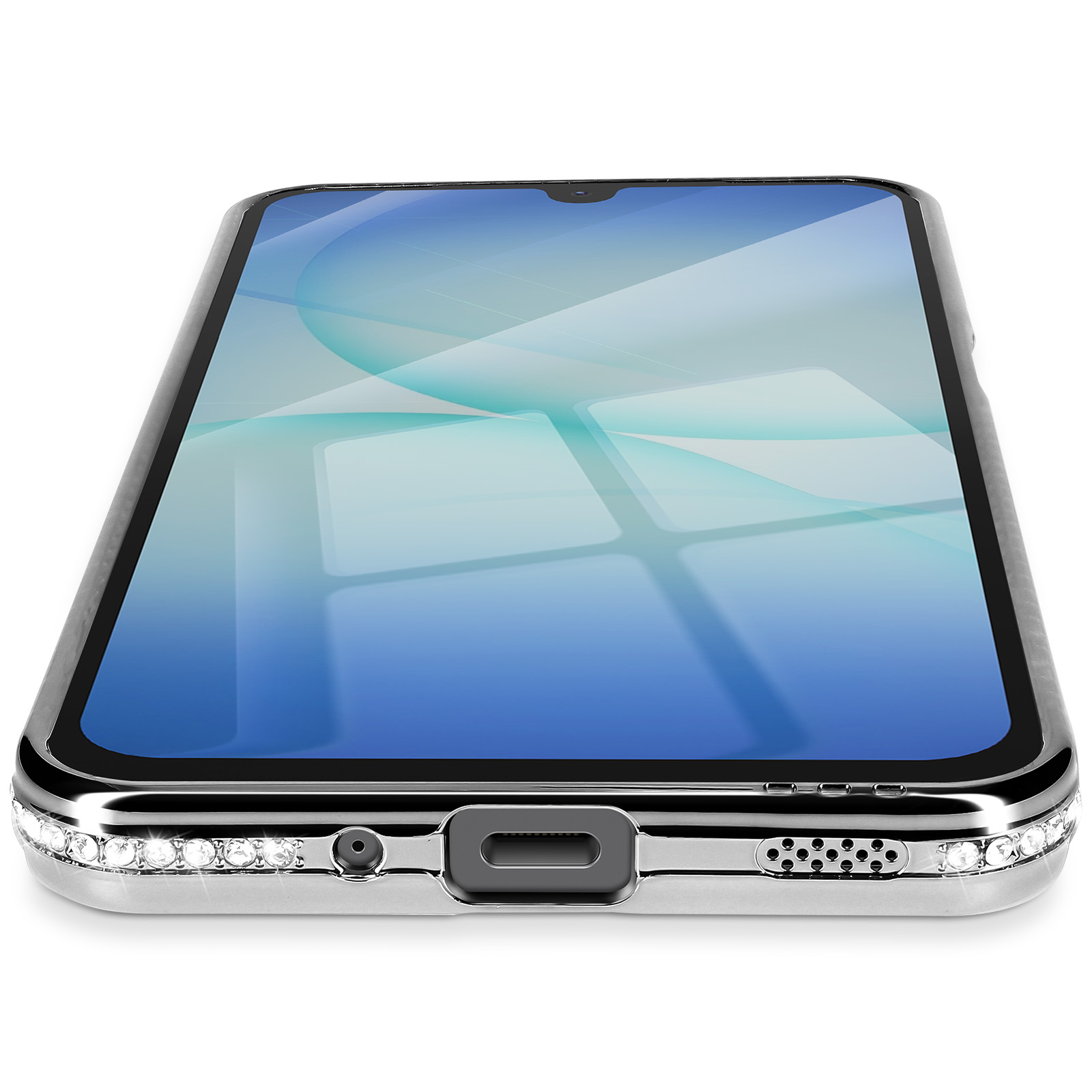 Un smartphone avec un écran bleu. Le téléphone a un cadre argenté avec des strass en bas. Le fond est blanc.