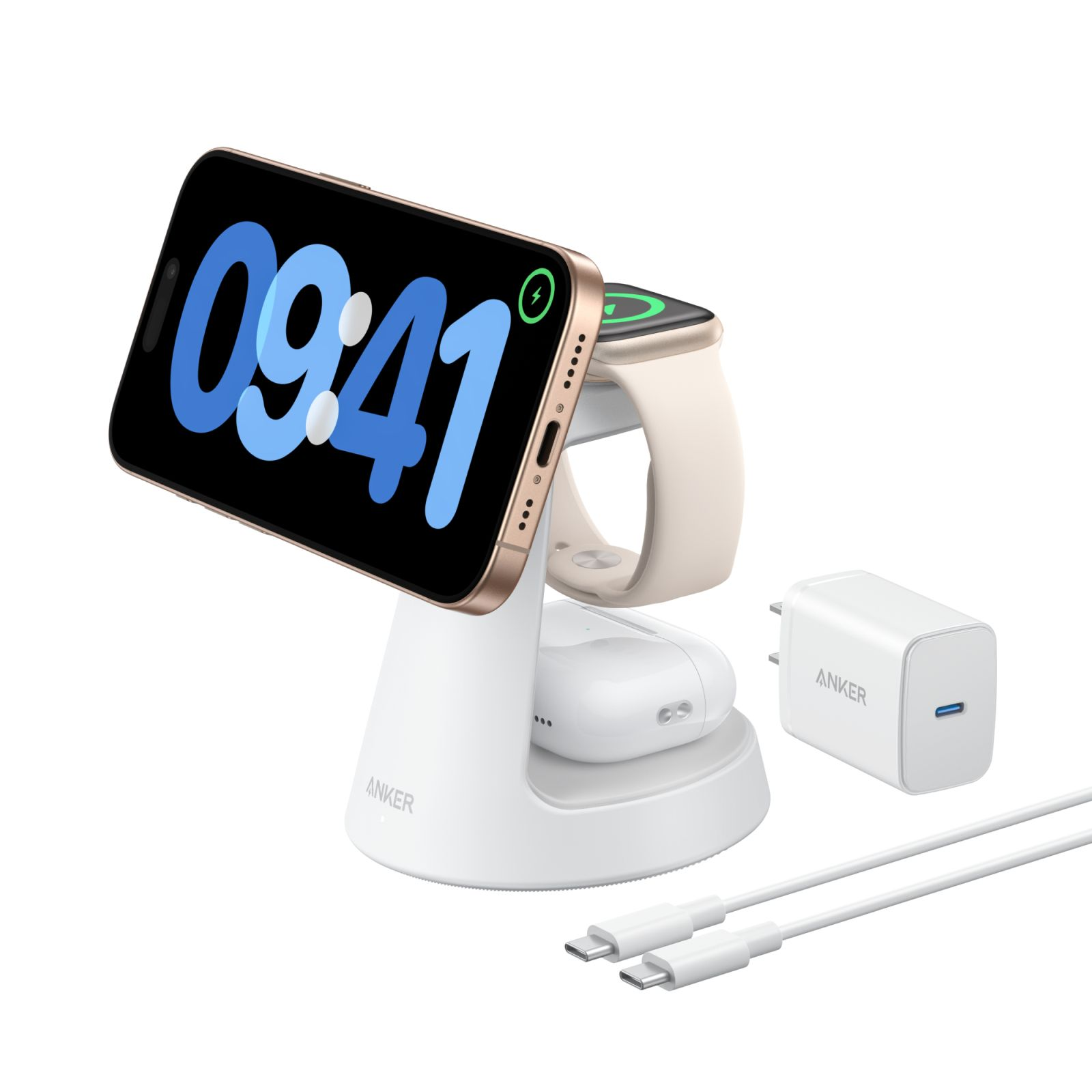 Eine weiße Ladestation mit einem Telefon, das 09:41 anzeigt, einer Apple Watch und AirPods. Anker-Ladegerät und Kabel sind ebenfalls vorhanden.