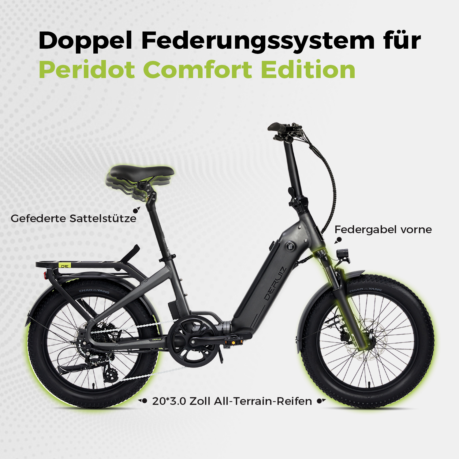 Ein graues Peridot Comfort Edition Klapprad wird gezeigt. Es hat schwarze Reifen, eine gefederte Sattelstütze und den Text 'Doppel Federungssystem'.