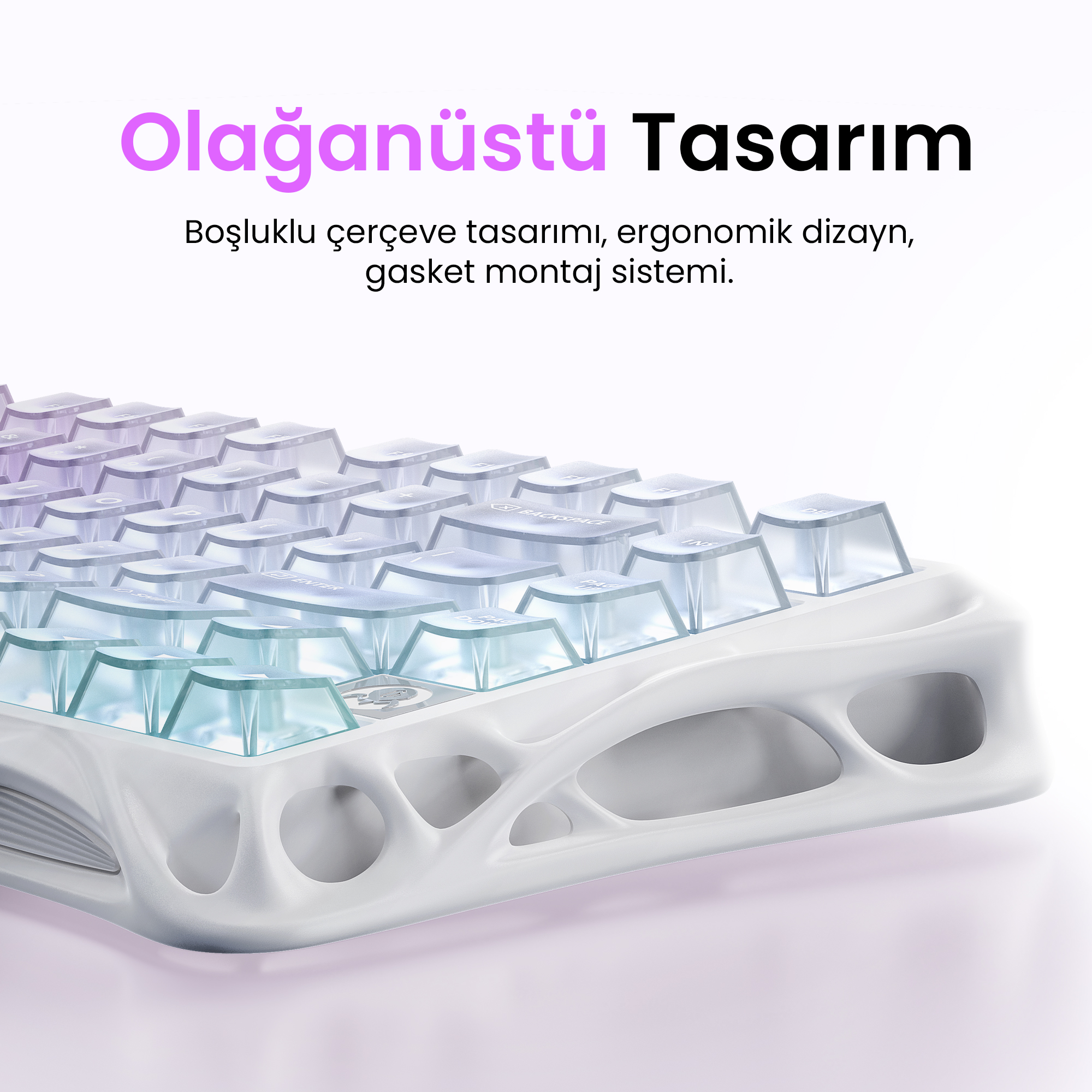 Biała klawiatura z przezroczystymi klawiszami. Tekst u góry brzmi: Niezwykły design.