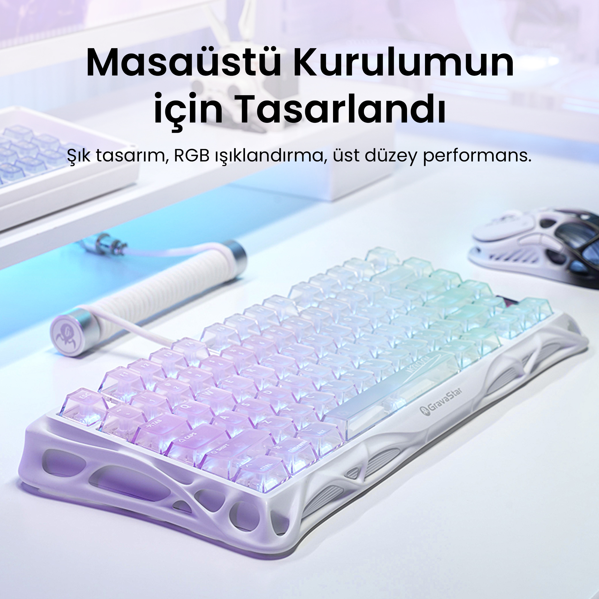 Biała klawiatura z podświetleniem RGB na białej powierzchni, po prawej biała mysz. Turecki tekst na górze.