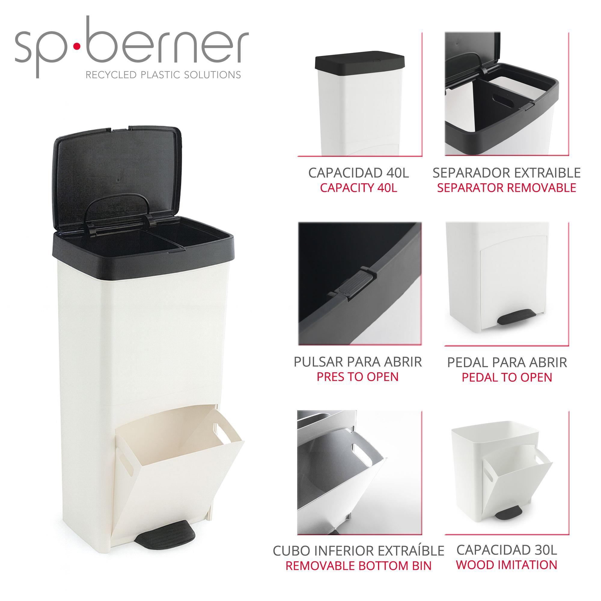 Un cubo de reciclaje blanco y negro con pedal y cubo inferior extraíble. La tapa es negra.