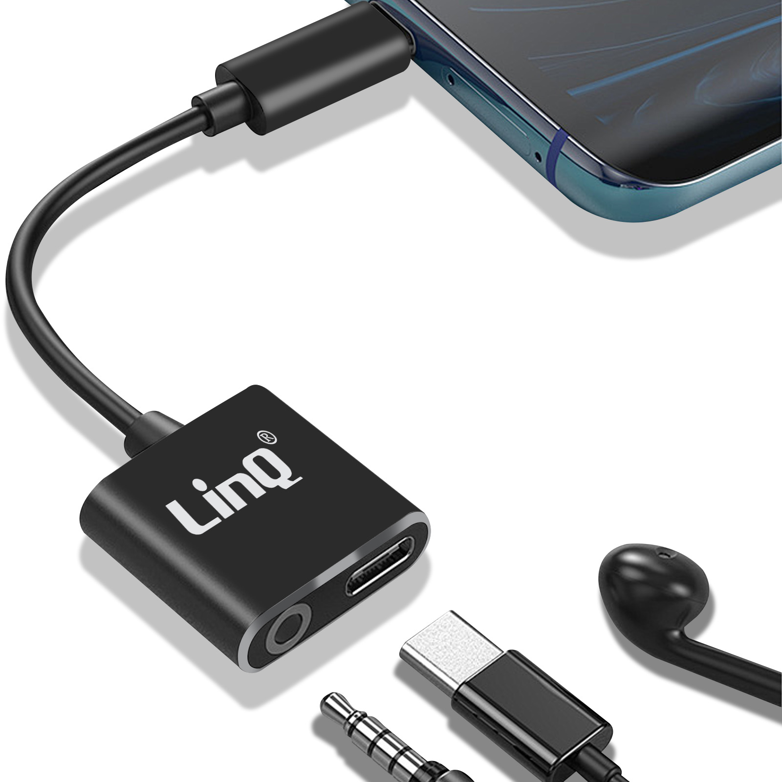 Un adattatore Linq nero collegato a un telefono. Sono presenti anche cavi per USB-C, jack audio e auricolari.