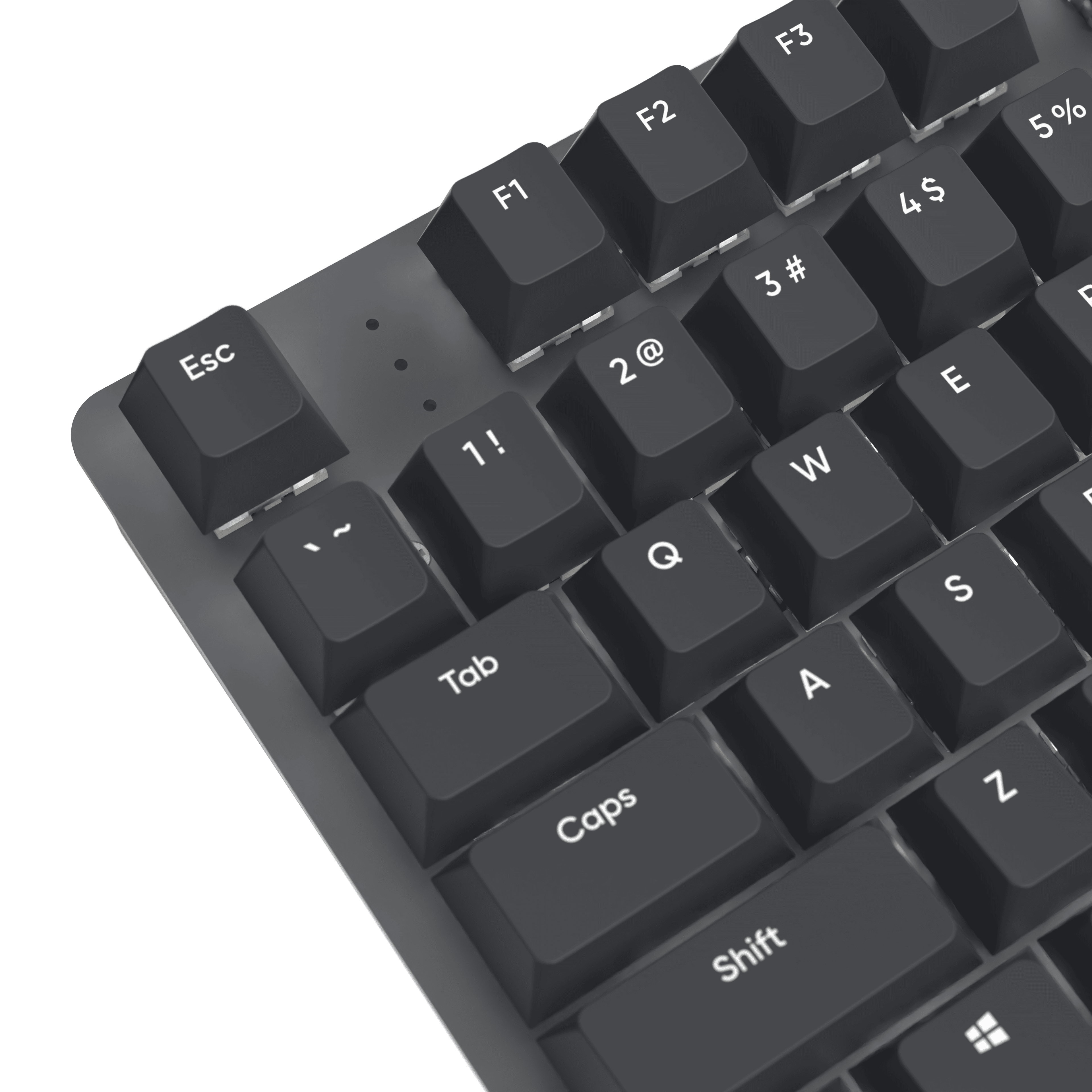 Nahaufnahme einer dunklen Tastatur. Zu den Tasten gehören Esc, F1-F3, Zahlen, Buchstaben, Tab, Caps und Shift.
