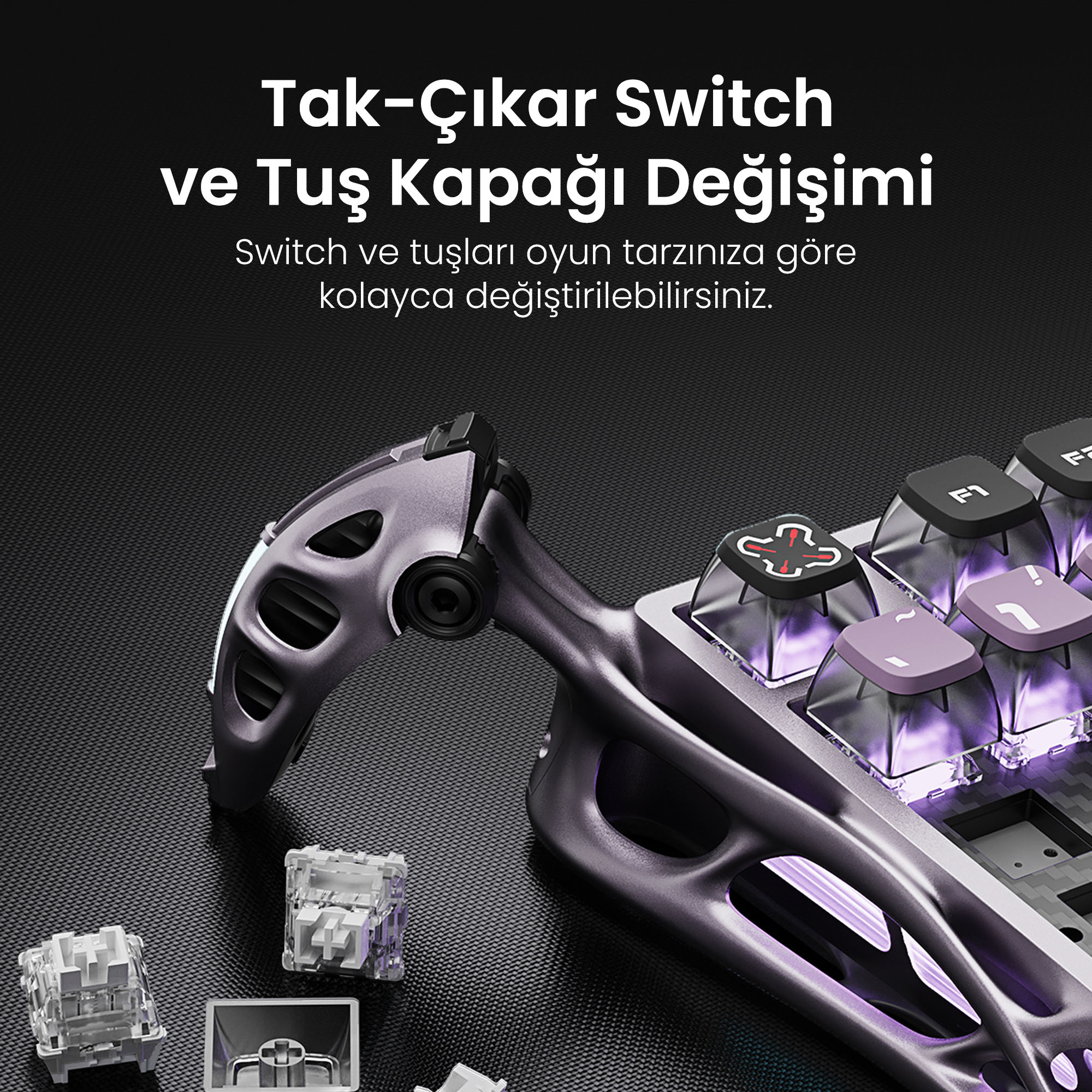 Zbliżenie klawiatury z fioletowymi klawiszami i unikalnym narzędziem do usuwania przełączników.