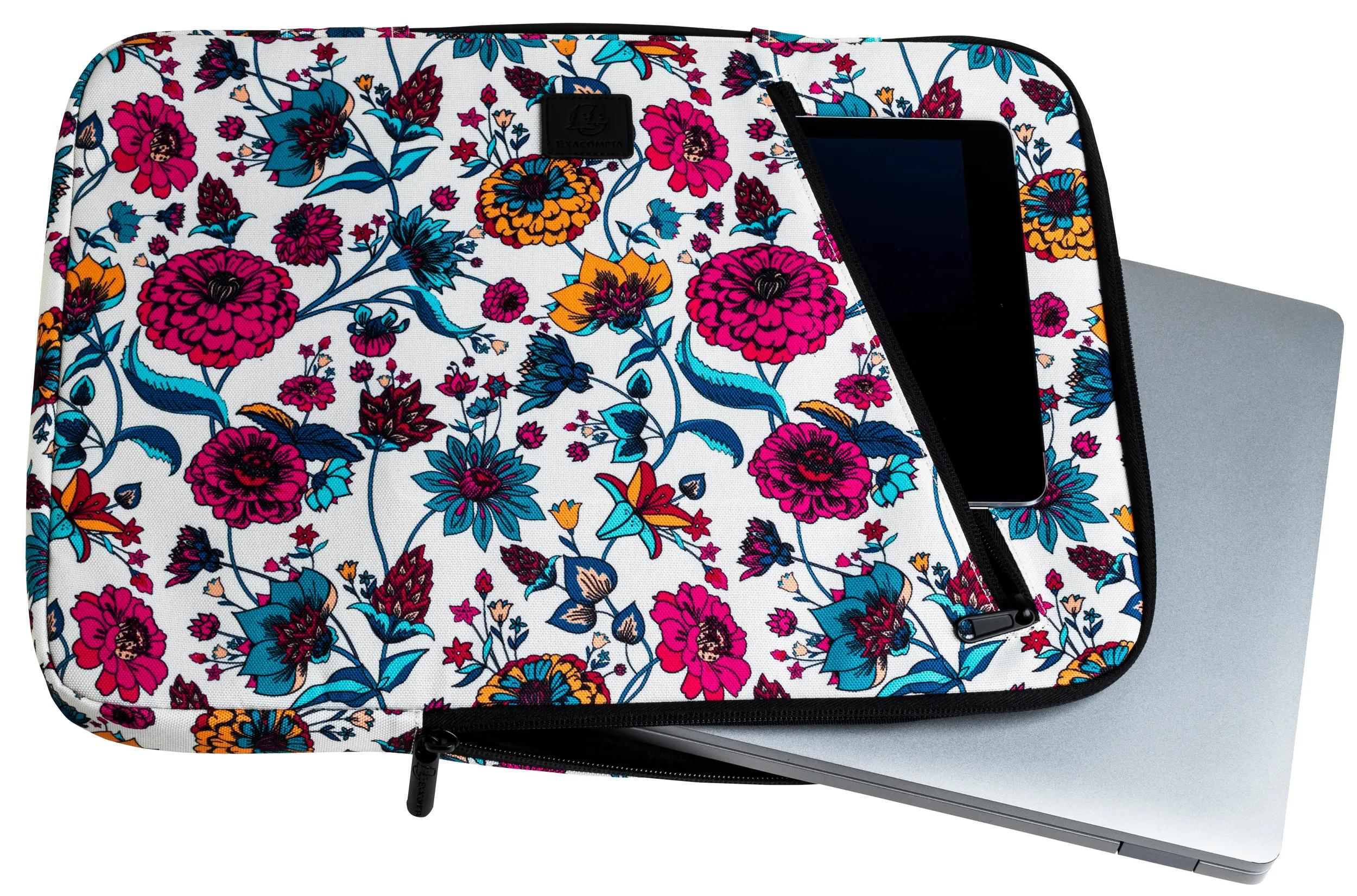 Una custodia per laptop con motivo floreale, un tablet all'interno e un laptop parzialmente visibile.