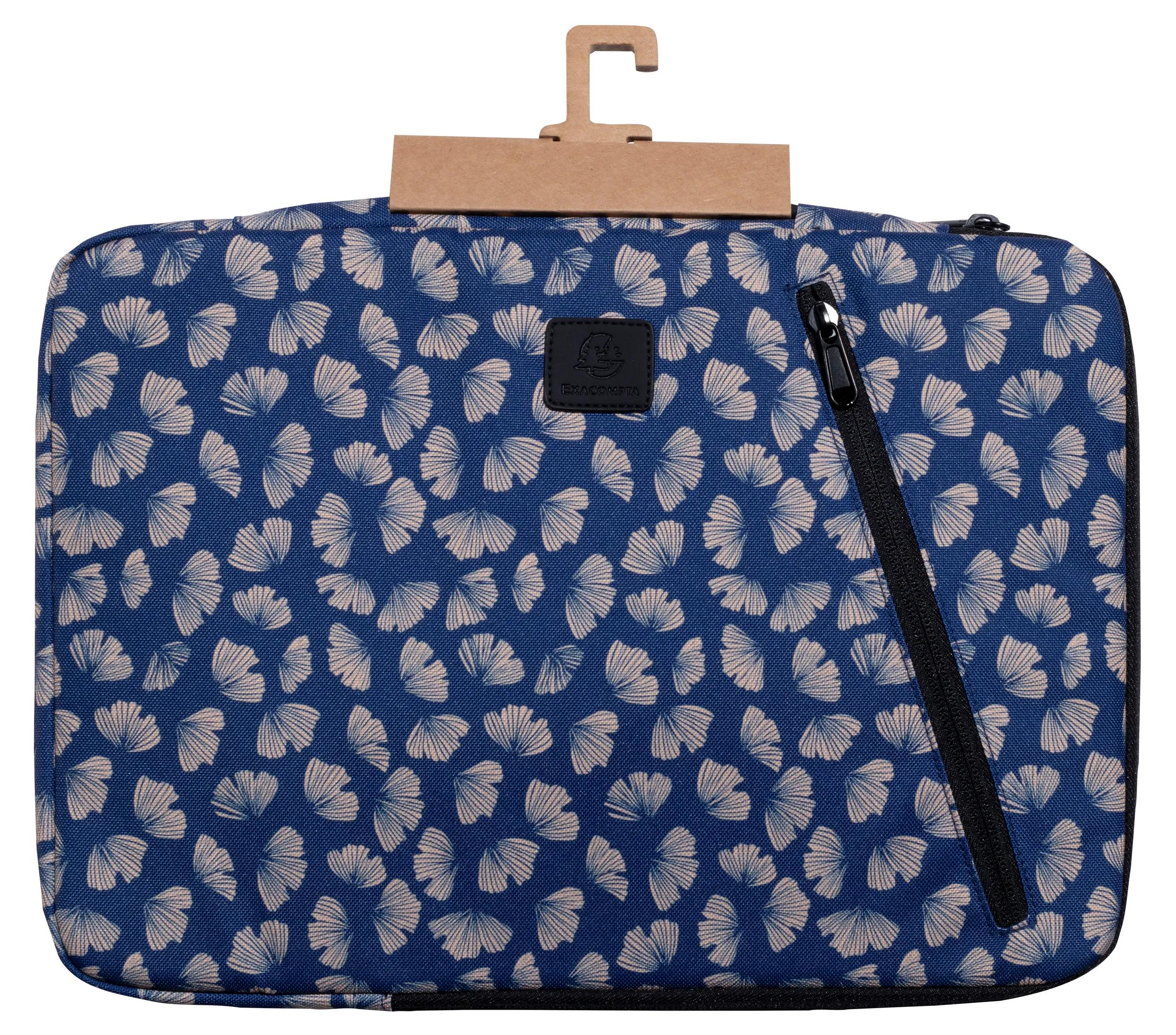 Una custodia blu per laptop con un motivo di forme a ventaglio beige, una cerniera nera e un gancio di cartone.
