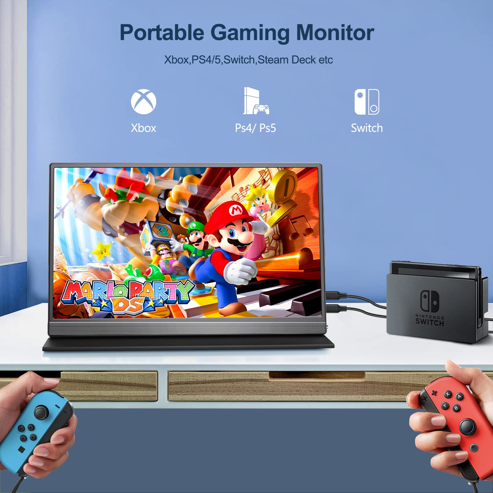 Ein Gaming-Monitor zeigt Mario Party. Eine Switch-Dockingstation und Controller sind vorhanden. Der Hintergrund ist blau.