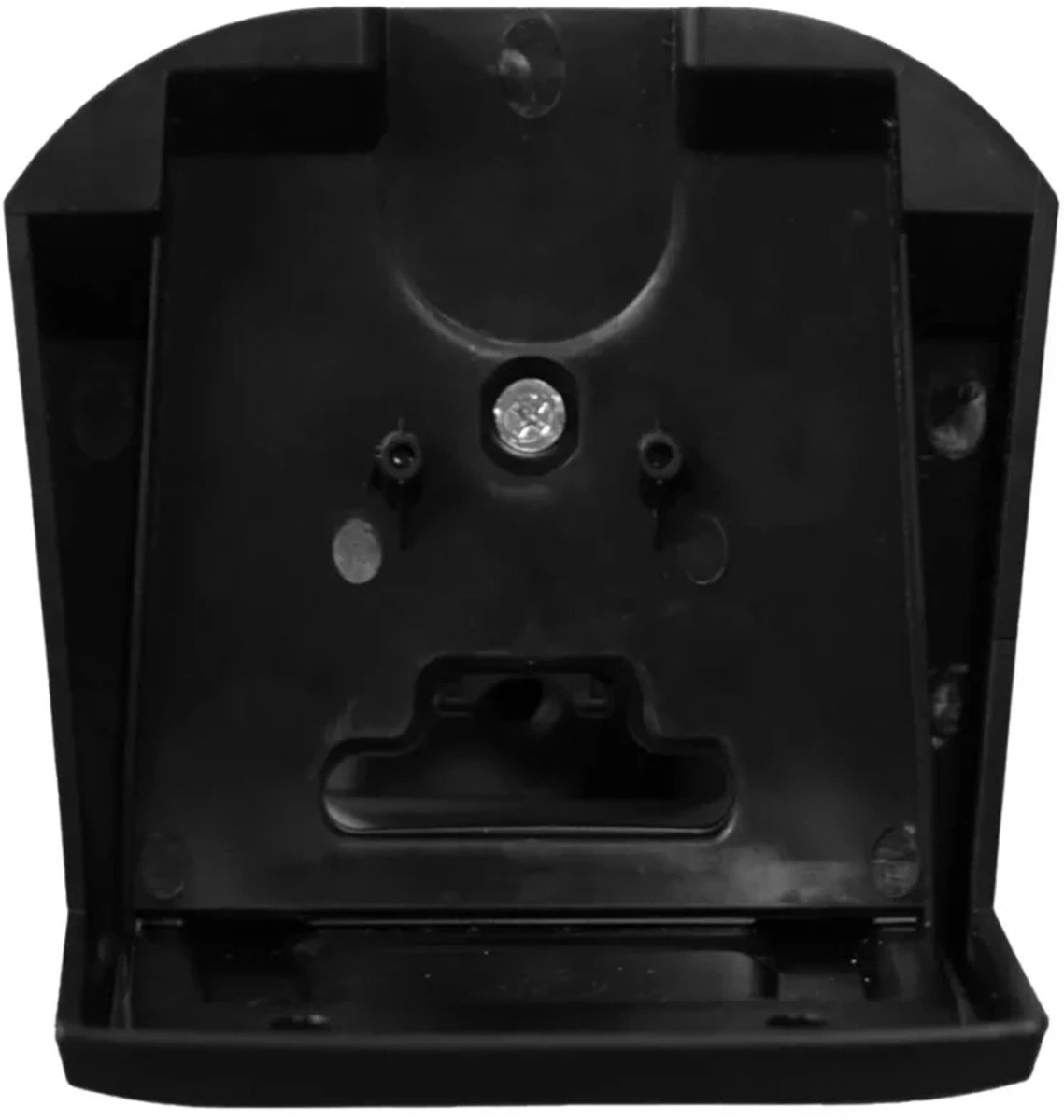 A close-up of a black plastic object with a recessed area, screw, and various holes. The object has an open, rectangular base.
