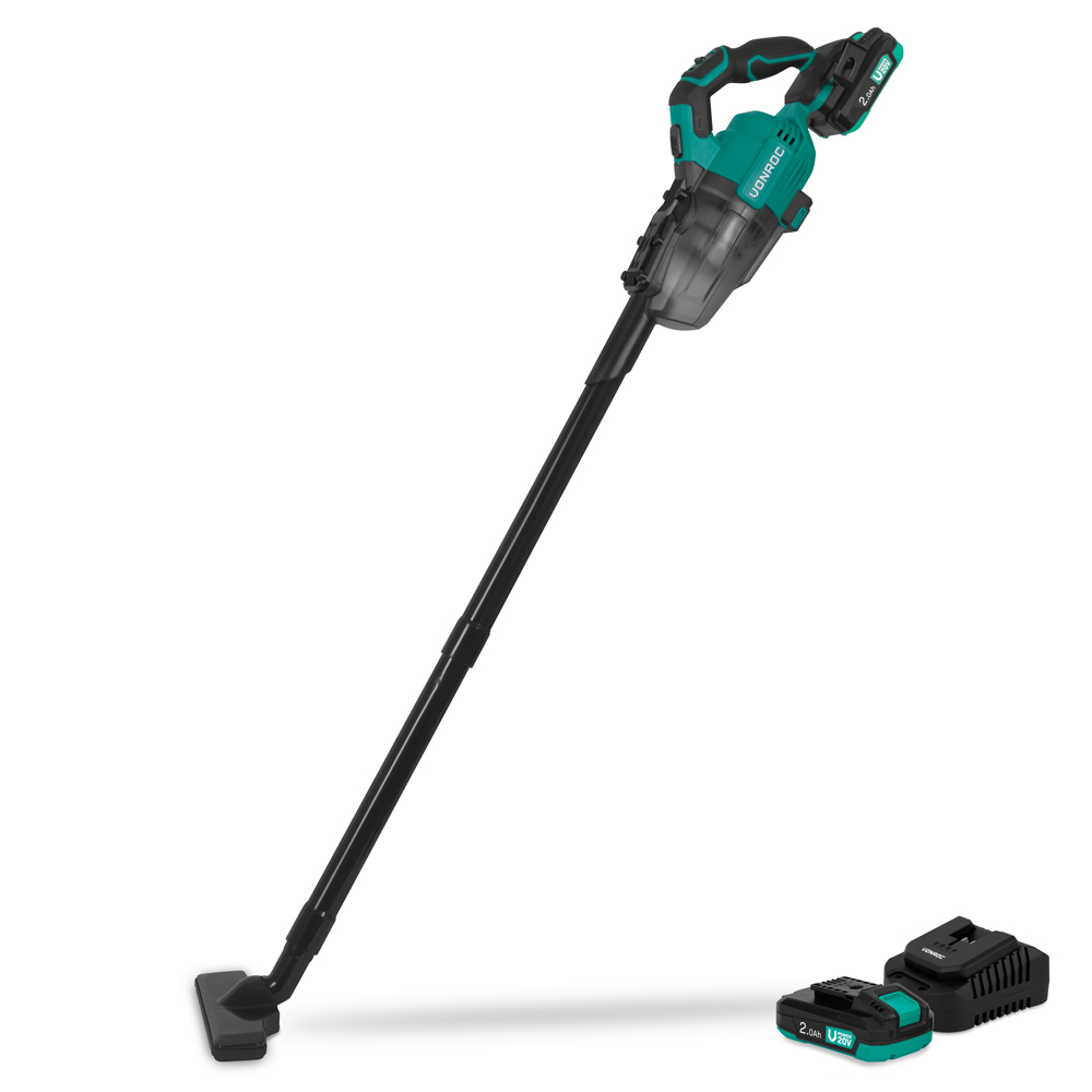 A cordless vacuum cleaner with a black handle, green accents, and a battery. Additional battery and charger are also present.
