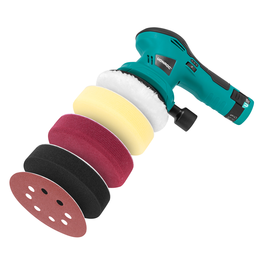 An electric polisher with multiple pads and a sanding disc. The polisher is teal and black. Pads are white, yellow, red, and black.