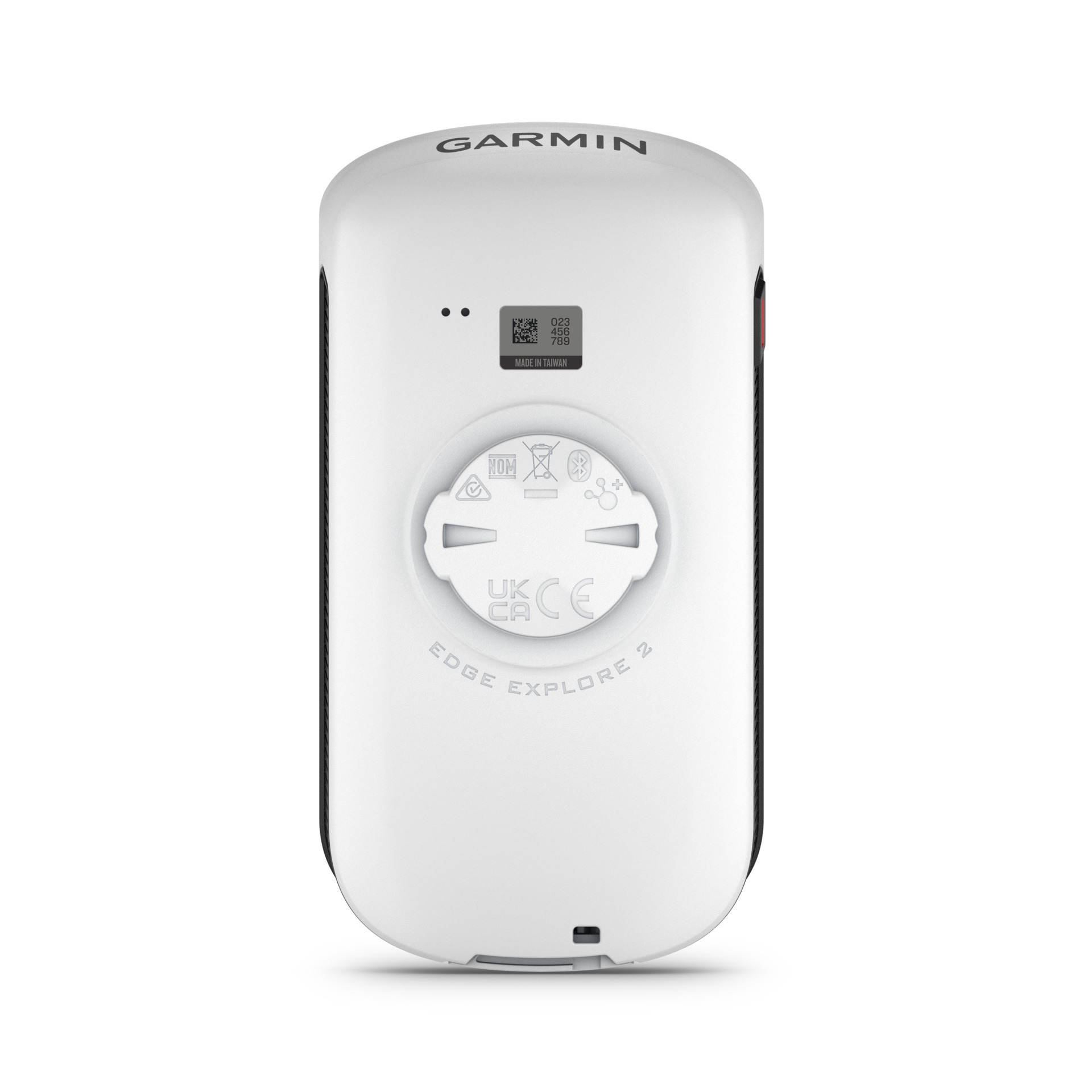Widok z tyłu białego Garmin Edge Explore 2. Ma czarne boki, logo Garmin i różne symbole regulacyjne.