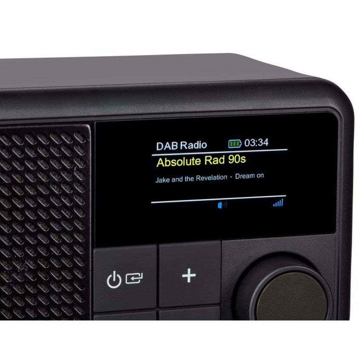 A black DAB radio displays 'Absolute Rad 90s'. Buttons include power, plus, and a tuning knob. The time is 03:34.