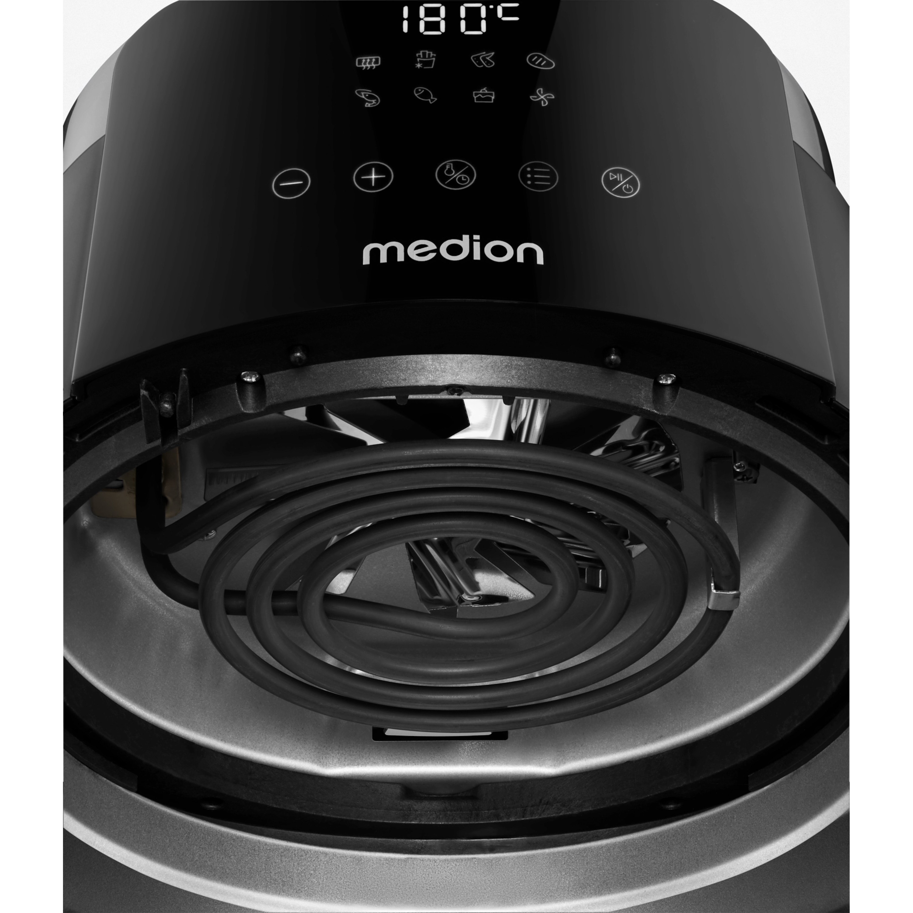 Close-up van een zwarte airfryer met digitaal display met 180°C. Binnenin zit een verwarmingselement.