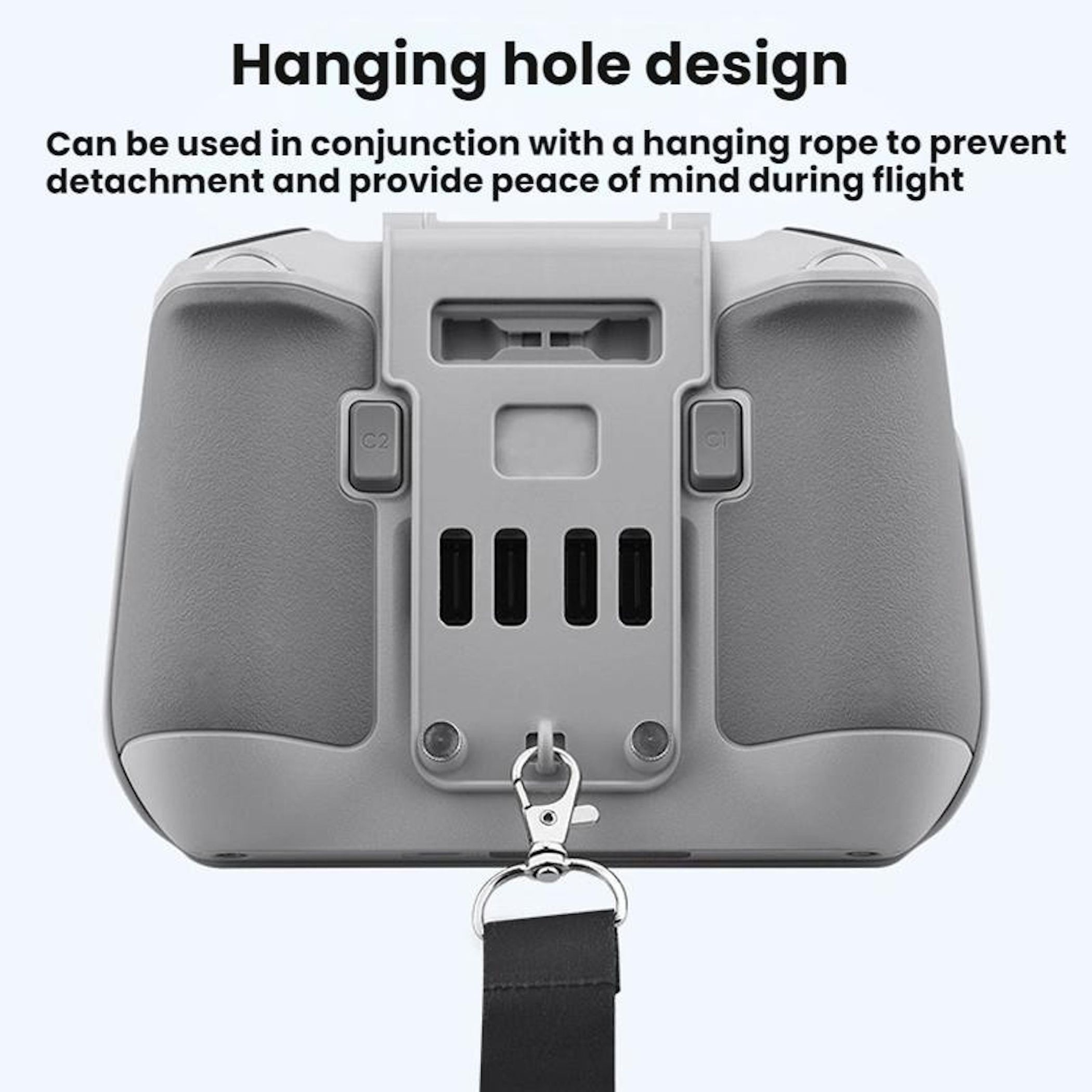 Ein grauer Drohnen-Controller mit Aufhängeloch-Design. Enthält ein Schlüsselband und einen Metallclip zur sicheren Befestigung.