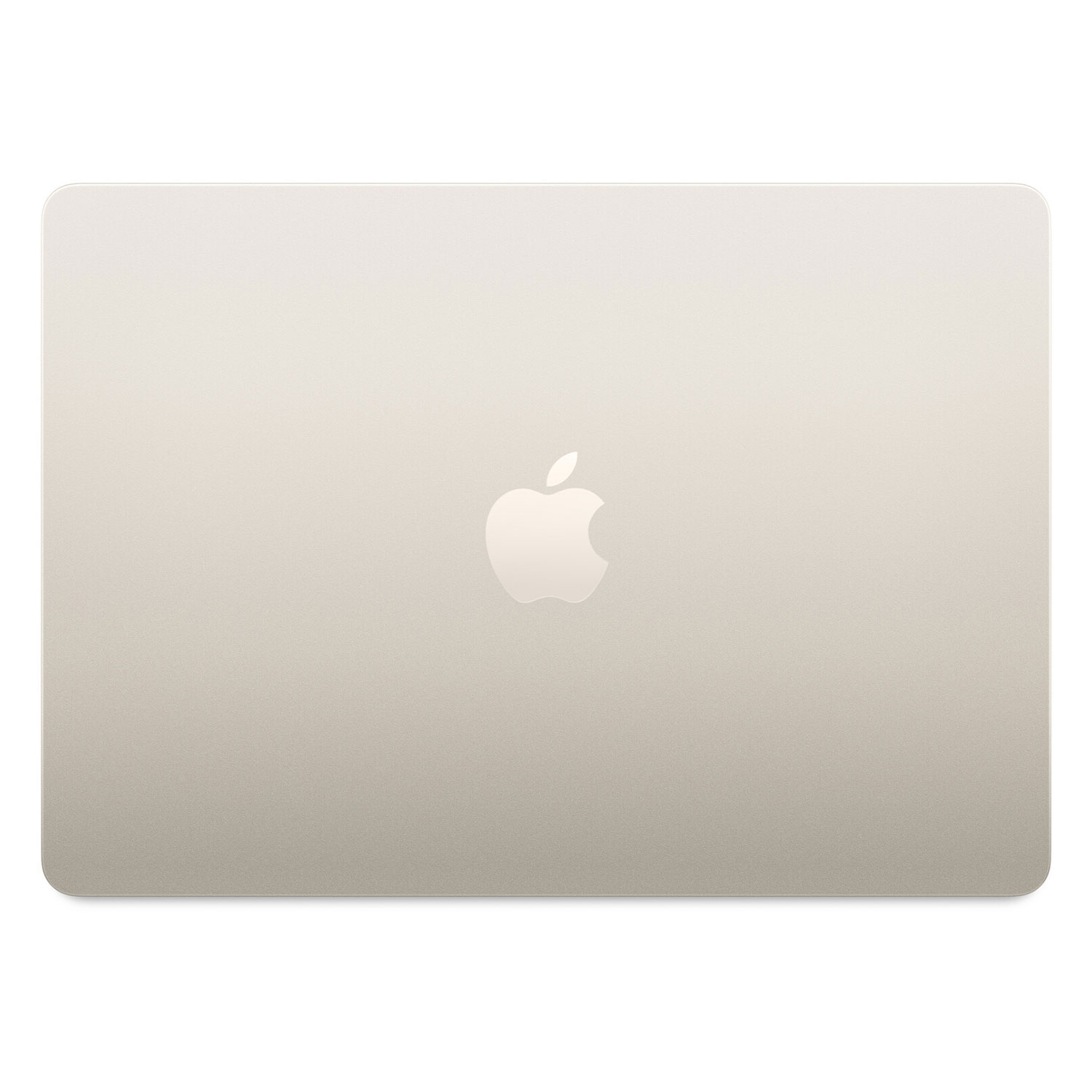 Zamknięty laptop MacBook, widok z góry. Kolor srebrno-złoty z logo Apple pośrodku.