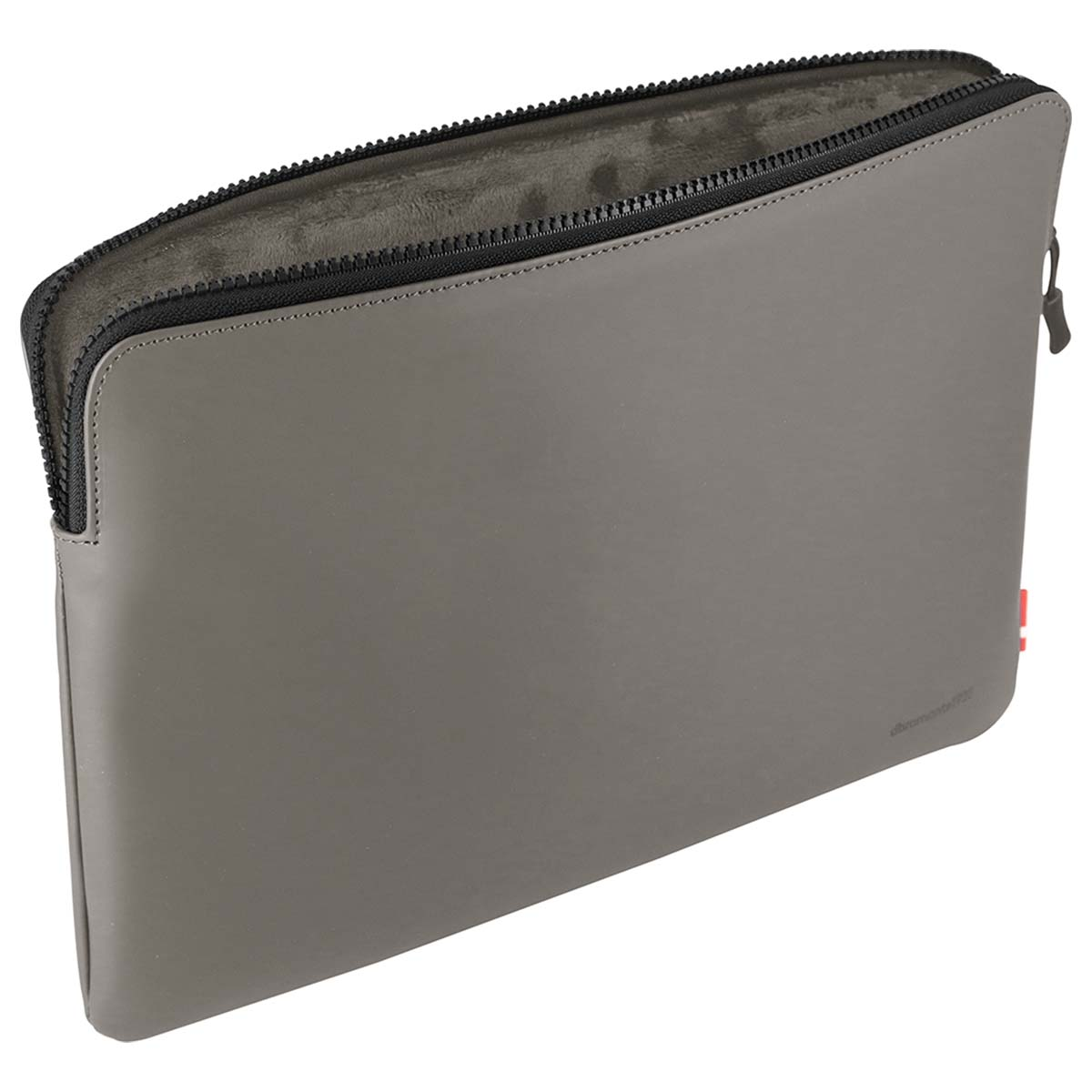 Una custodia grigia per laptop con cerniera nera. L'interno è grigio più scuro. Una piccola etichetta rossa è visibile.