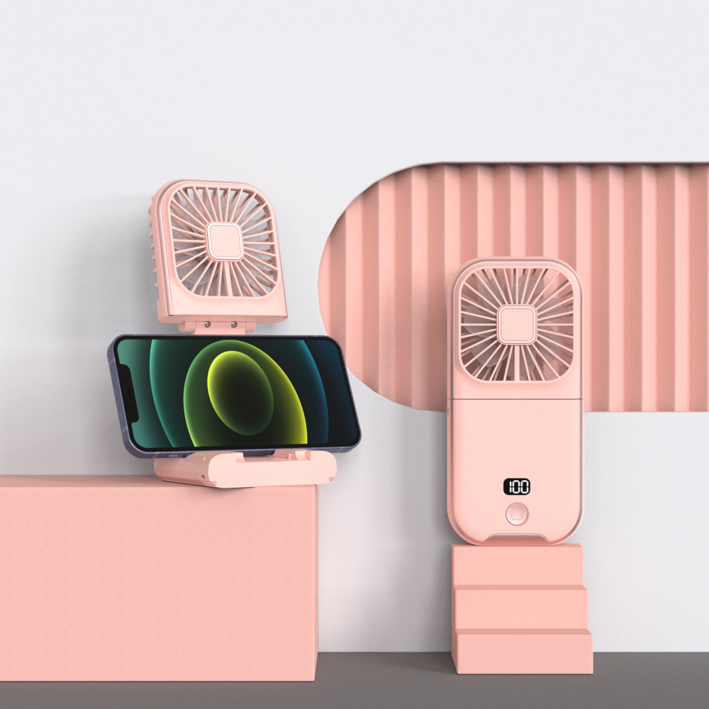Rosa Ventilatoren und ein Telefon mit grünem Display werden auf einem hellrosa Hintergrund mit weißem Hintergrund angezeigt.