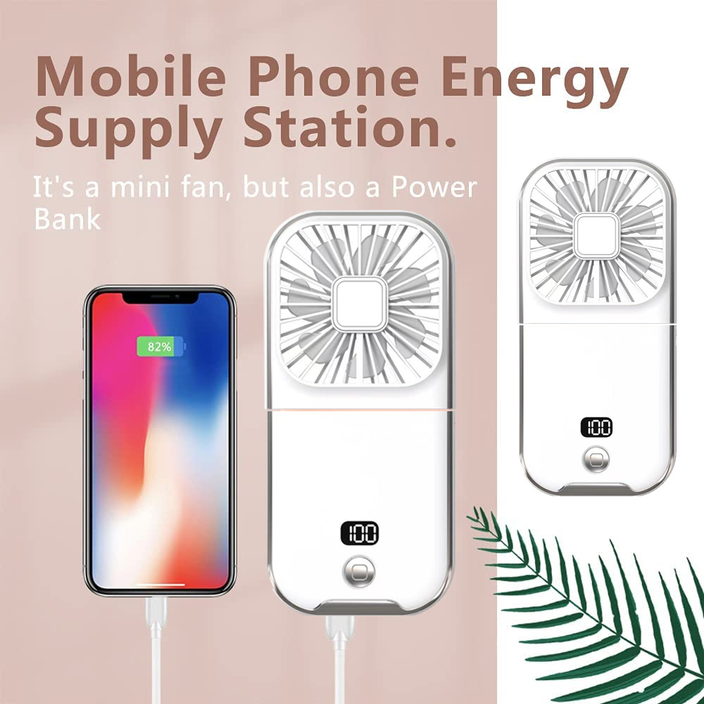Das Bild zeigt ein ladendes Telefon und zwei weiße Mini-Ventilatoren mit LCD-Anzeigen und Text, der besagt, dass es sich um eine mobile Energieversorgungsstation handelt.