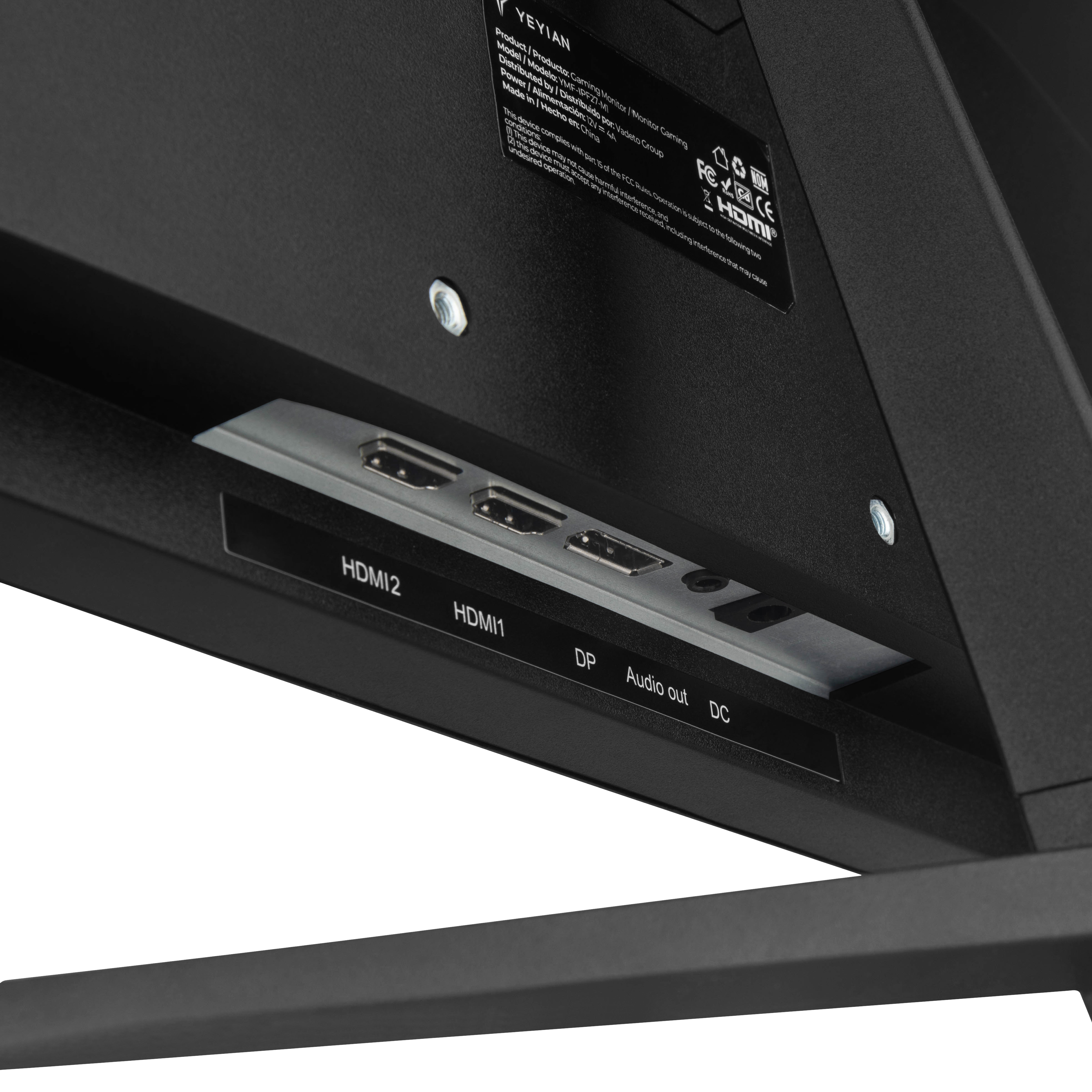 Primer plano de la parte trasera del monitor. Muestra puertos HDMI, entrada de alimentación y etiqueta de información del producto. Color negro.