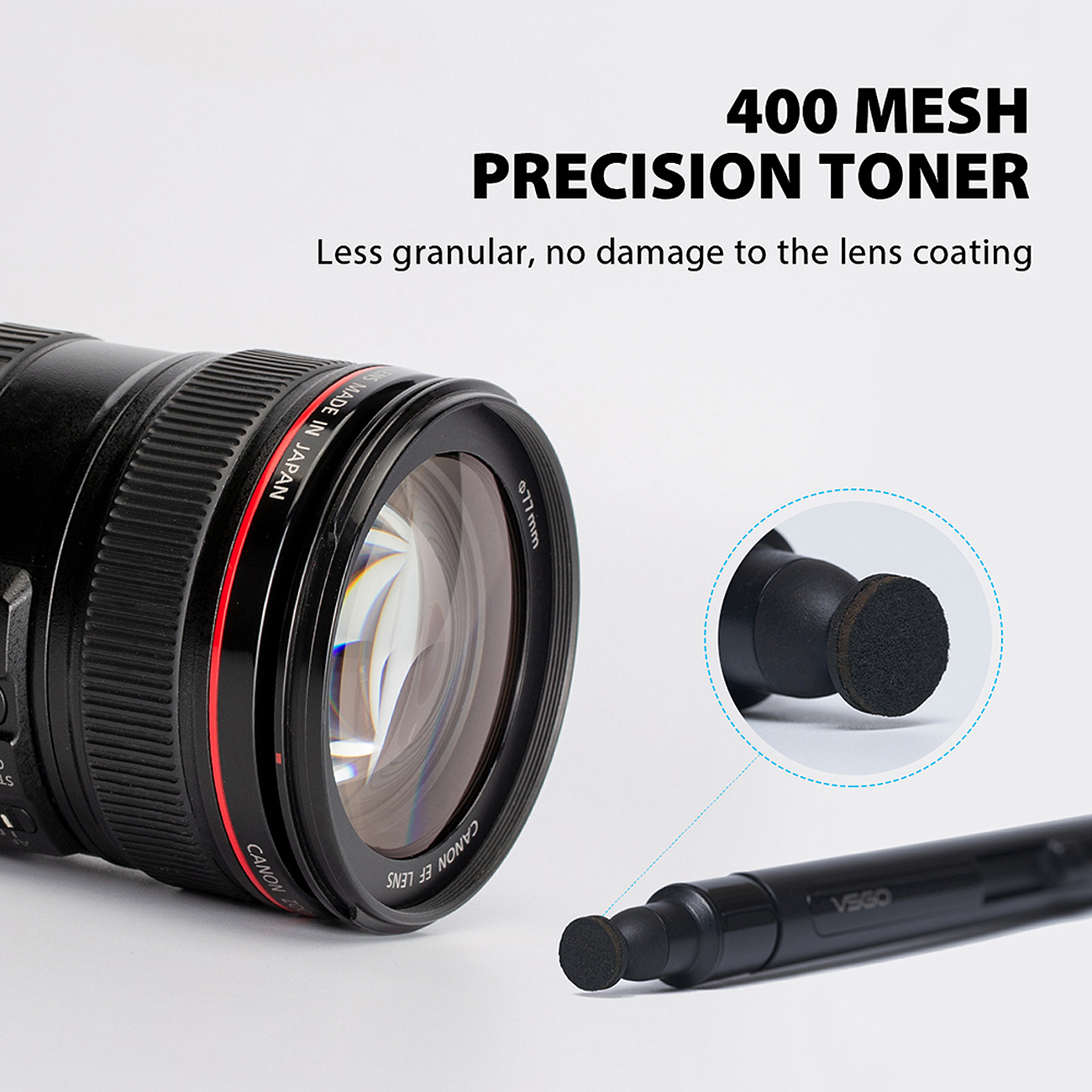 Eine Canon-Linse und ein Linsenreinigerstift liegen auf einer weißen Oberfläche. Text: 400 Mesh Präzisionstoner. Weniger körnig, kein Schaden.