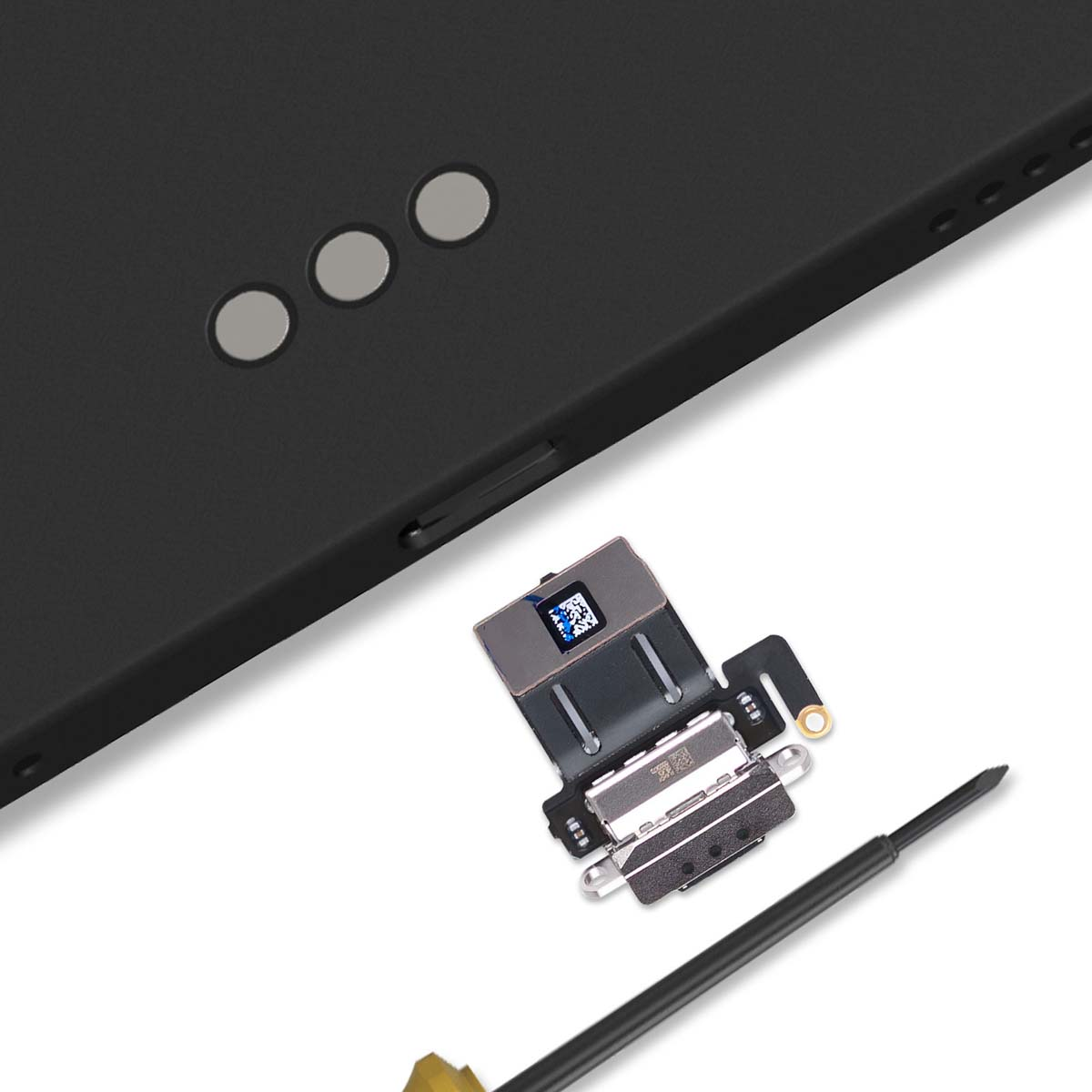 Schwarzes Telefonteil mit drei silbernen Punkten und einer Komponente. Ein Schraubenzieher ist in der Nähe. Weißer Hintergrund.